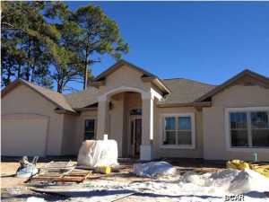 NEW CONSTRUCTION,NEARLY FINISHED, with a completion date of March 15th, 2015. This Quality built home has over 2400 sq ft under heat and air, and is in the beautiful Palm Bay neighborhood. This spacious home has four bedrooms, three full baths,and a formal dining room. Some of the numerous features include,10 and 11 ft tray ceilings, recessed lighting, crown molding in common areas, 20'' porcelain tile and granite in the kitchen and all bathrooms. The well equipped kitchen features a large breakfast bar with pendant lights, 42'' wood cabinetry, stainless appliances, a walk-in pantry and a breakfast area. The luxurious master bath boasts a large walk-in closet, a double vanity with brushed nickel faucets, granite, and a large garden tub plus a over sized tiled shower and a linen closet.