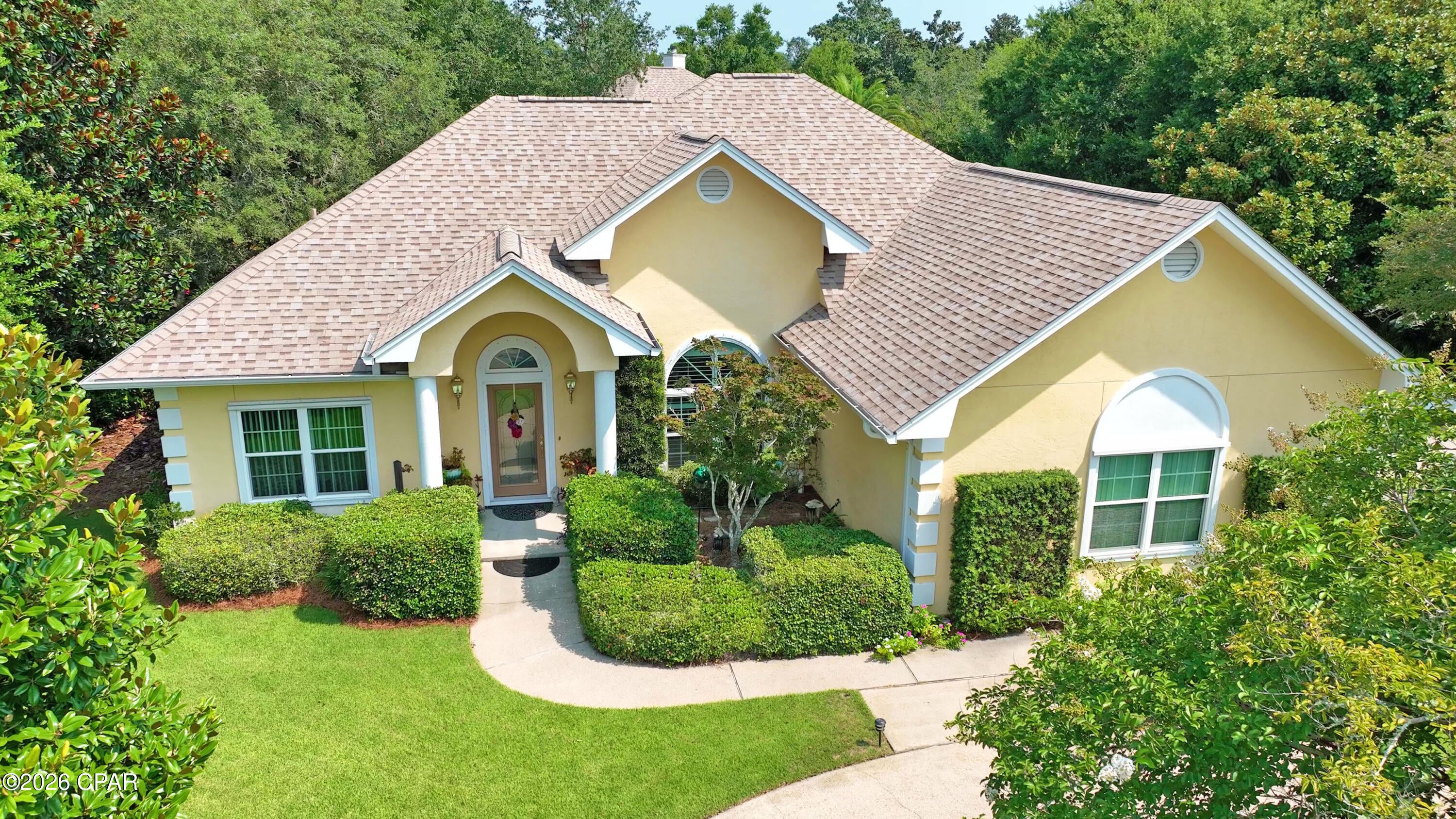 I'm pleased to present this exceptional residence within the distinguished gated community of Bay Point. While the community offers an enviable resort-style lifestyle - including a Jack Nicklaus designed championship golf course, full-service marina and yacht club, and dining and entertainment at Bar 72 - it is the warmth, character, and individuality of this home that truly sets it apart.
Beautifully positioned on a corner lot of a cul-de-sac, the property enjoys a wonderful sense of privacy and tranquility.
Inside, an expansive yet comfortable semi-open floor plan provides the ideal setting for both relaxed everyday living and entertaining. The vaulted living areas flow naturally from one space to another, creating a home that feels spacious without ever losing its warmth or
intimacy. The many distinctive features include luxurious white oak flooring and a beautiful two- sided fireplace allowing the warmth and ambiance to be enjoyed from multiple living spaces.
The dining area is particularly versatile; offering an elegant setting for entertaining, or
presenting an opportunity to create a library, office, or den. It is this flexibility, combined with the home's distinctive character, that gives the next owner the opportunity to make the
residence uniquely their own. The eat-in kitchen features quartz countertops and a glass backsplash.
Both bathrooms have unique glass block windows, while the recently remodeled primary bathroom features a deep soaking tub, separate shower, and generous walk-in closet with custom wood shelving that is reflective of the shelving throughout the house.
Outside, the property truly comes into its own. Two driveways add convenience for both
owners and guests. The artistically landscaped grounds are framed by mature trees, lush vegetation, and established gardens, creating a timeless backdrop with an exceptional degree of privacy. The back patio extends the living space outdoors, while the hot tub offers a
wonderful place to unwind. Whether enjoying morning coffee surrounded by greenery,
relaxing after a day on the golf course, hosting friends for evening cocktails, or simply
enjoying a quiet afternoon at home, the outdoor spaces invite you to slow down and
appreciate the settings.
The sellers are leaving the [generator type/brand/model] with the home. (where/how else to put this in the narrative?)
Ultimately, this is more than a residence in a desirable gated community. It is a home with a distinct sense of place - private, welcoming, beautifully landscaped, and filled with the kind of character that photographs alone cannot fully convey.
