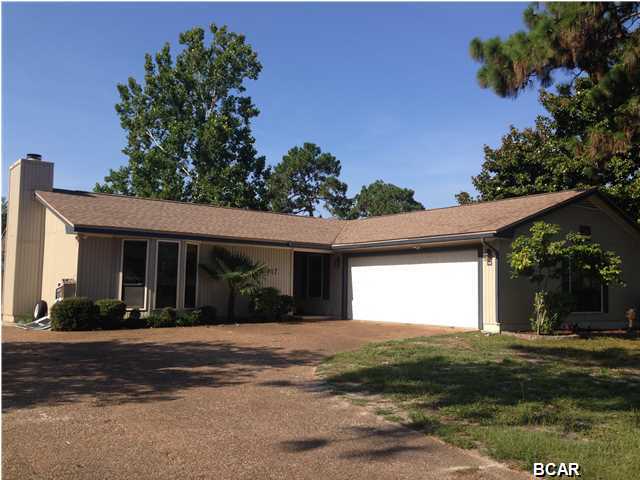 Beautiful home with a large POOL (POOL SERVICE INCLUDED) in a great centrally located neighborhood. This home is a 3 bedroom + 2 bath with an oversized garage and a storage shed in the back yard. Will have fresh paint and new Interior re-painted recently and new flooring in main living areas. Home has vaulted ceilings and TWO living rooms with TWO fireplaces. Kitchen has been updated with granite counter tops and glass tile back splash. Home also has a bonus room for storage or small office ( 7 x 7) located in giant foyer area. Master bath has been updated with tiled shower and new vanity. Master bedroom also has walk-in closet. HUGE tangerine tree in the back yard full of fruit will be ripe in the fall! Neighborhood is just off 23rd Street, only 3 min. to Walmart!