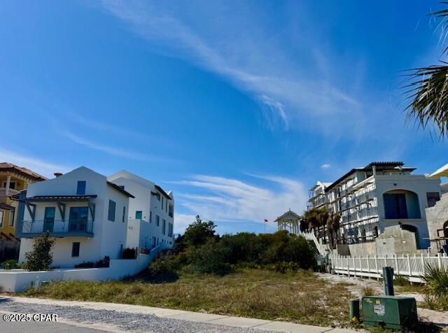 Last spectacular 60' gulf front lot with its own private beach walkover and across the street from Lake Carillon.  The exceptional depth of this lot allows for a large house, a pool, and an oversized guest house.  Previously approved plans for a magnificent
house and guest house are available.  Do not miss out on this last 60' gulf front lot in
Carillon Beach.