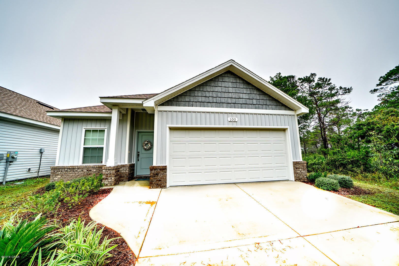 ***THIS HOME WON'T LAST!*** NO HURRICANE DAMAGE! Built in the spring of 2017, this gorgeous home is every beach goer's dream in the heart of Panama City Beach, FL. Just 1/2 mile to the beach, this coastal cutie boasts 9' ceilings, a gorgeous OVERSIZED quartz kitchen island, ideal for entertaining, a screened in patio for those long summer nights and even an array of fruit yielding citrus trees in its very own fenced in back yard. The garage fits two vehicles and best of all, there is no HOA! Conveniently located to some of the area's best dining, shopping, schools and much more! Call to view today, because at this price, this home will not last! The zoning of this home does not allow for short-term rentals.