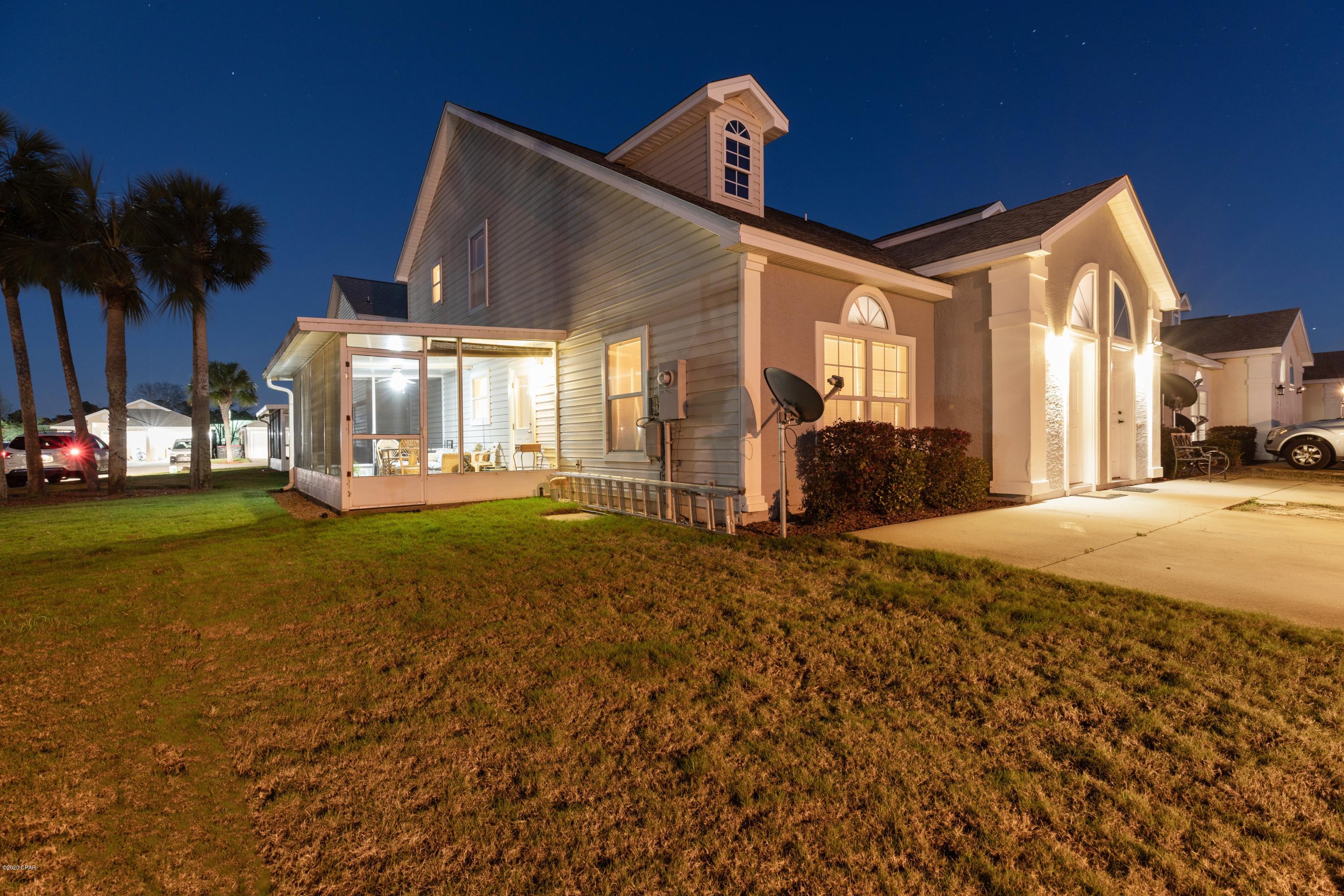 Ideal beach get-away or a starter home! Income producing property. ***New Roof***

Beautifully tiled beach townhome featuring 1,432 sqft 3BR/2.5 bath is situated in a centrally located gated community of Palm Cove, less than a mile from the white sands of Panama City Beach. Vaulted ceiling and ample windows which makes for a spacious feel with abundant natural light. Master bedroom, master bath, kitchen with walk-in pantry and laundry room are located on the first floor. Second-floor features  two large bedrooms and a spacious full bath. Large screened wrap around porch is definitely a great addition to the property. 

Only minutes from the neighborhood's two pools and main entrance with manned guardhouse. Ideal location with close proximity to the beach, Edgewater Shopping Plaza, Grand Panama Shopping Center, Lowes/Home Depot, Shipwreck Water Park, restaurants and entertainment. This beautiful turnkey beach
house will make for an ideal beach get-away or a starter home. Management company keeps up your lawn, community pools and the front gate controlled. Zoned for A+ schools. Age, Square Footage, and room sizes approx.,if important please verify.