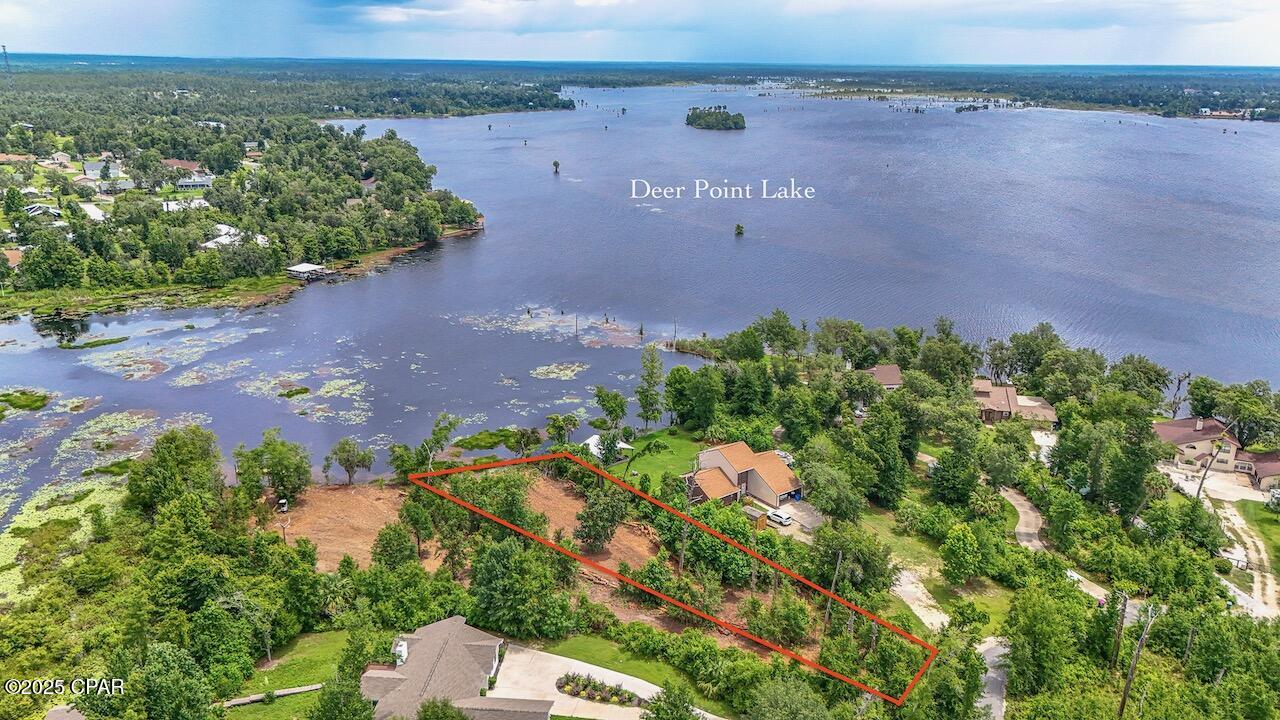 Major Price Improvement and Priced to Sell! Unobstructed waterfront lot on Deer Point Lake located in the peaceful Osprey Point neighborhood and zoned R-2. Tucked away on a quiet waterfront cul-de-sac with only 12 homesites, this property offers the perfect setting for those dreaming of building a private waterfront home surrounded by tranquility and natural beauty.
This rare opportunity features nearly half an acre with approximately 136 feet of pristine water frontage on beautiful Deer Point Lake. The lot is approximately 90% cleared and includes a newly installed power box, offering significant savings during the building process. With ample space for a custom home and outdoor entertaining areas, this property is ideal for hosting gatherings and enjoying the waterfront lifestyle. Build your own private dock and take advantage of some of the best fishing on Deer Point Lake.
Deer Point Lake spans over 5,000 acres and is fed by natural freshwater streams, making it a favorite destination for boating, kayaking, canoeing, fishing, and leisurely cruises on its calm, clear waters. The area offers convenient access with nearby marinas and public boat ramps. A survey is available and has been uploaded to the MLS for buyer review.
Don't miss this exceptional opportunity to own a premium waterfront homesite. Contact your favorite REALTOR® today for more information before this remarkable property is gone.