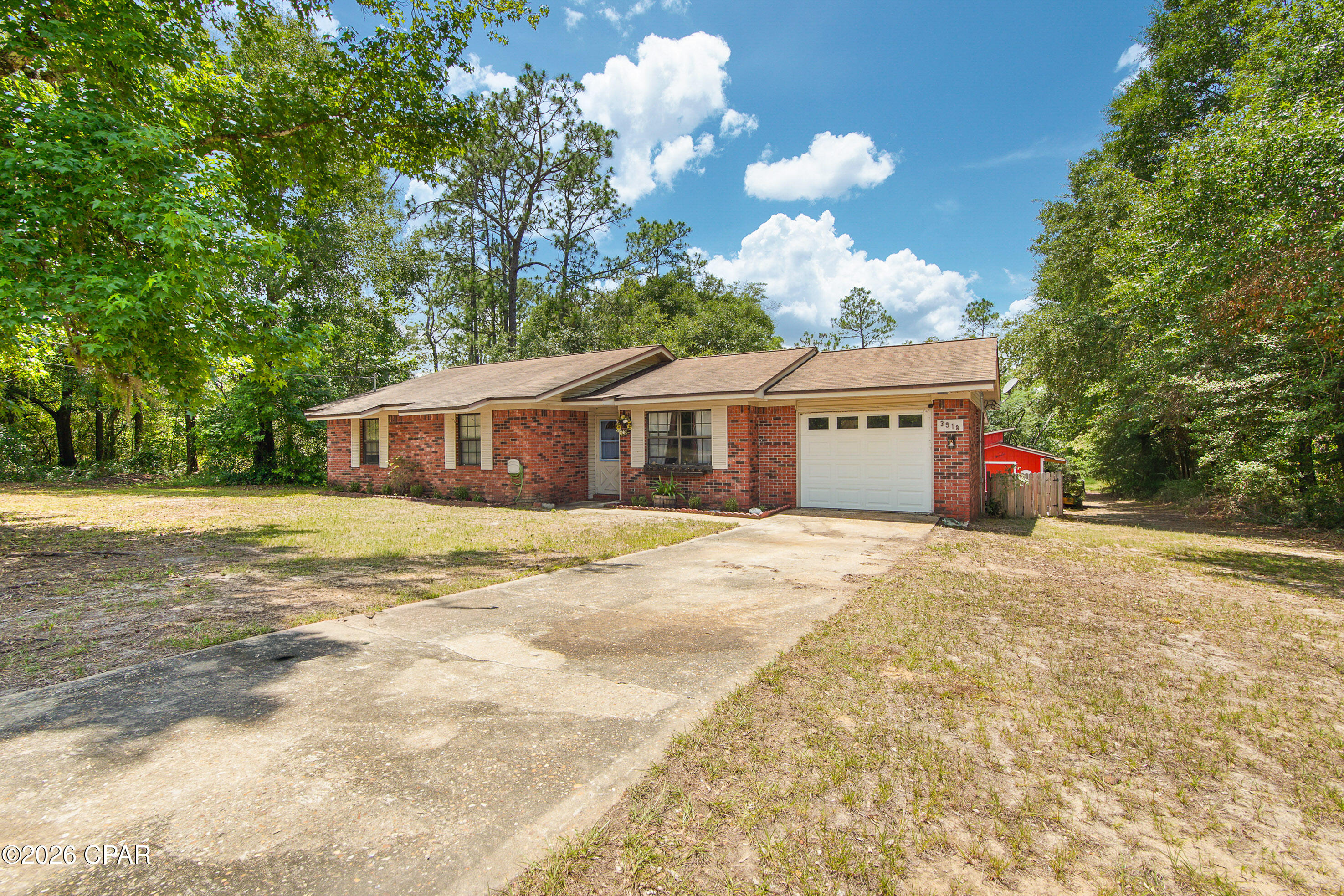 Back on the market! NO FAULT TO SELLER. 
This 3 bedroom, 2 bathroom brick home offers a comfortable layout with plenty of space to make your own. The home features a welcoming living area, generously sized bedrooms, master bedroom includes a private bath along with a walk-in closet and a bright Florida-room that provides additional space perfect for relaxing, entertaining, a home office, or a playroom. On the opposite side of the Florida-room, you'll find an attached screened porch, offering a great spot to enjoy the outdoors year-round. The backyard has an outbuilding with electricity. 

Located in Sunny Hills Community, enjoy access to a popular 18-hole golf course, Holmes Creek, Choctawhatchee River and nearby lakes. Situated approximately 45 minutes to our beautiful Gulf and 30 minutes to I-10.
