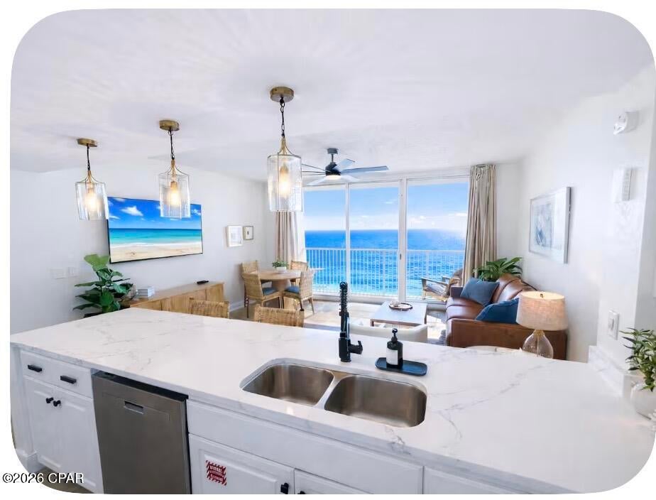 TURNKEY GULF-FRONT INVESTMENT OPPORTUNITY! This beautifully updated 1-bedroom + bunk area, 2-full-bath condo offers the layout vacationers love, spectacular Gulf views, extensive 2025-2026 upgrades, and the flexibility to enjoy as your own beach retreat while offering excellent short-term rental potential.

Welcome to Majestic Beach Resort Tower 1, Unit 1405, where an incredible beachfront location and extensive updates come together to create the perfect Panama City Beach getaway!

This beautifully furnished condo has been refreshed throughout with fresh interior paint, new black door hinges and door knobs, kitchen hardware, pendant lighting and light fixtures, rugs, décor and artwork. All beds and furnishings are new, including a leather sleeper sofa in the living area, along with new indoor and outdoor furniture. Recent appliance upgrades include a new washer, dryer and dishwasher.

The second bathroom received extensive 2025-2026 updates including a new vanity, toilet, mirror, lighting, towel racks, shelving and décor. The previously remodeled primary bathroom has been further enhanced with a new vanity mirror, faucets, towel racks and hardware. Additional recent improvements include LVT flooring in the primary bedroom and bath and three TVs.

Step outside onto your private balcony and take in the emerald waters of the Gulf of Mexico and Panama City Beach's famous sugar-white sand. Enjoy morning coffee overlooking the Gulf, relax after a day on the beach, or end the evening with an unforgettable Florida sunset.

MAJESTIC BEACH RESORT AMENITIES ARE EXCEPTIONAL! Owners and guests enjoy an impressive collection of resort-style amenities including two large Gulf-front outdoor pools, two heated indoor pools, a kiddie pool and three hot tubs. The resort also offers direct beach access, Gulf-front beach services, a fitness center, tennis/pickleball court, game room and an on-site movie theater with stadium seating.

Enjoy the convenience of the Majestic Market, deli and Starbucks, along with the seasonal H2O Poolside Bar & Grill, boutique shopping and beach gear rentals. Additional amenities include conference facilities, covered parking, air-conditioned walkovers connecting the parking garage to the resort, charcoal grills and 24-hour security.

With the furnishings, décor and extensive updates already completed, Unit 1405 is truly ready to enjoy from day one. Whether you're searching for a personal Gulf-front escape, second home or income-producing vacation rental, this property offers an outstanding combination of location, desirable sleeping configuration, resort amenities and recent improvements.

Bring your suitcase and start enjoying the Panama City Beach lifestyle--the work has already been done!