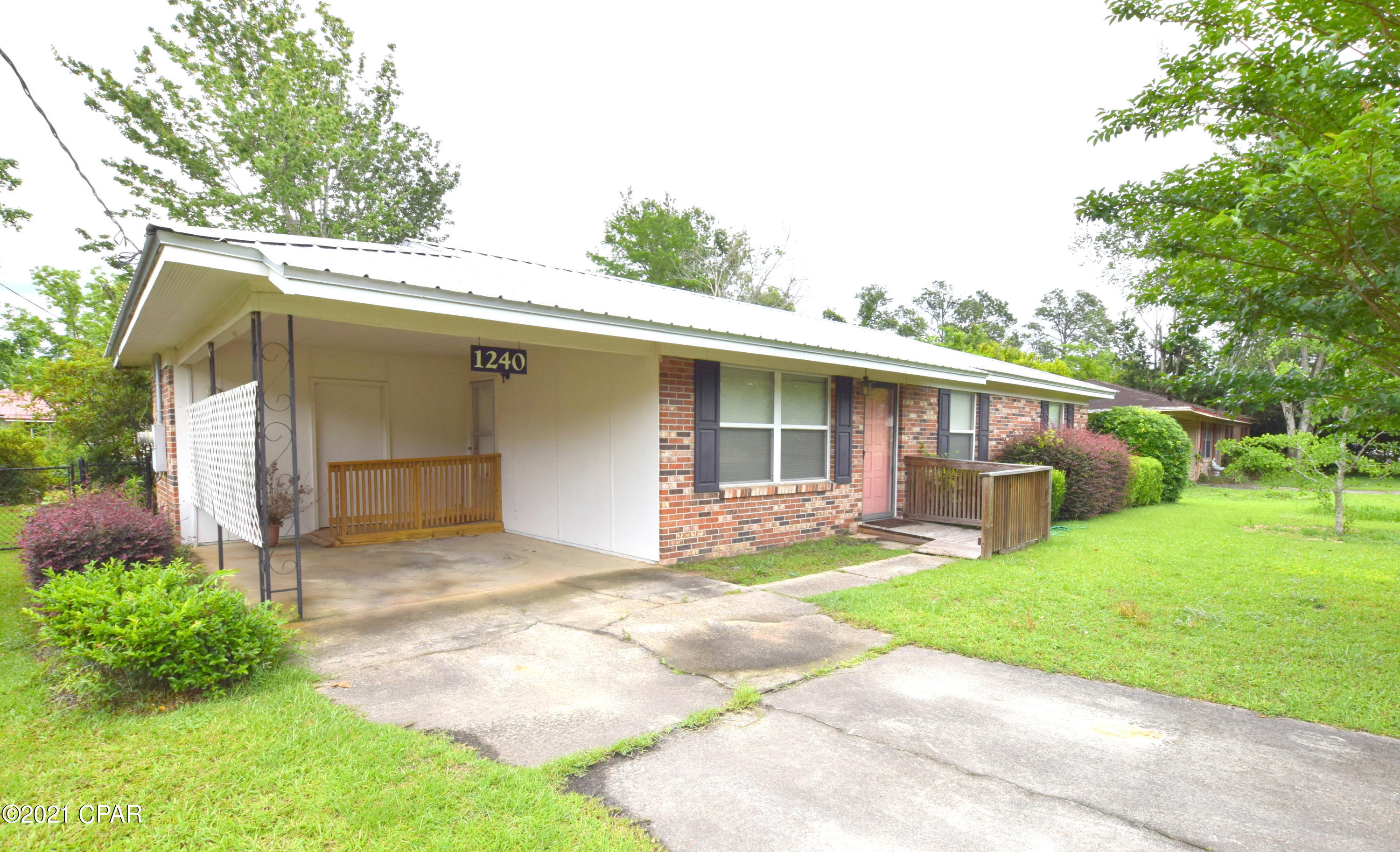 Nestled in the heart of Chipley this brick beauty has been well maintained and is awaiting its new owners! Inside features include a spacious living room, eat-in kitchen with pantry, 3 bedrooms and full bath. Outside you will find luscious landscaping, fenced backyard, and an attached carport. Property is located in a quiet neighborhood close to restaurants, shopping and schools!