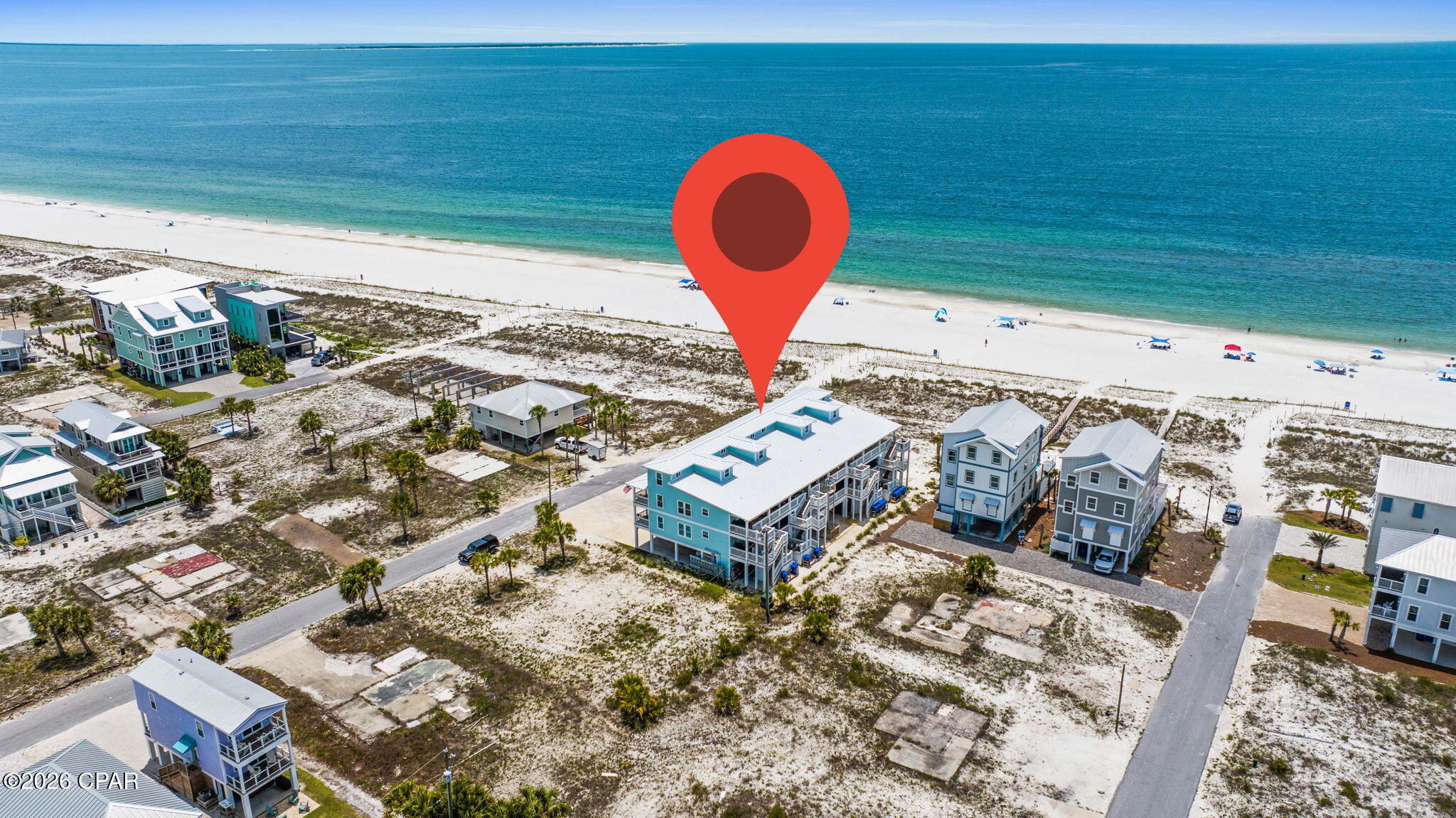 BEACHFRONT BLISS AWAITS!!  Experience the best of Mexico Beach living from this beautifully furnished 4 bedroom/3 bath condominium offering sweeping Gulf views, effortless coastal charm & exceptional flexibility as a personal retreat, vacation getaway or income-producing investment.  Just steps from the sugar-white sand beaches & emerald waters of the Gulf of Mexico, this spacious residence captures stunning water views from multiple vantage points, creating a breathtaking backdrop for morning coffee, afternoon relaxation & unforgettable sunset evenings. The welcoming floor plan offers generous gathering spaces ideal for entertaining family & friends after a day spent enjoying the beach, fishing, boating or exploring all that Mexico Beach has to offer. The main living level features two comfortable bedrooms along with inviting living, dining & kitchen areas designed to maximize both functionality & coastal ambiance. Upstairs, two additional sleeping areas provide outstanding flexibility for guests, extended family or vacation renters. Whether hosting weekend visitors or maximizing rental occupancy, the layout is designed to comfortably welcome everyone. Additional amenities include an elevator lift for easy access between levels & a dedicated BBQ area perfect for outdoor gatherings while enjoying the coastal breeze. Located in the heart of Mexico Beach, you'll enjoy golf cart-friendly streets, locally owned restaurants, boutique shopping, marina access, world-class fishing, boating adventures & the laid-back coastal lifestyle that makes this charming beach town one of Florida's most sought-after destinations.  Whether you're searching for a vacation retreat, a turnkey investment property or your own piece of paradise along the Forgotten Coast, this Gulf-view condominium offers the perfect combination of location, comfort, convenience & income potential. Call for your private tour & LIVE THE BEACH LIFE!