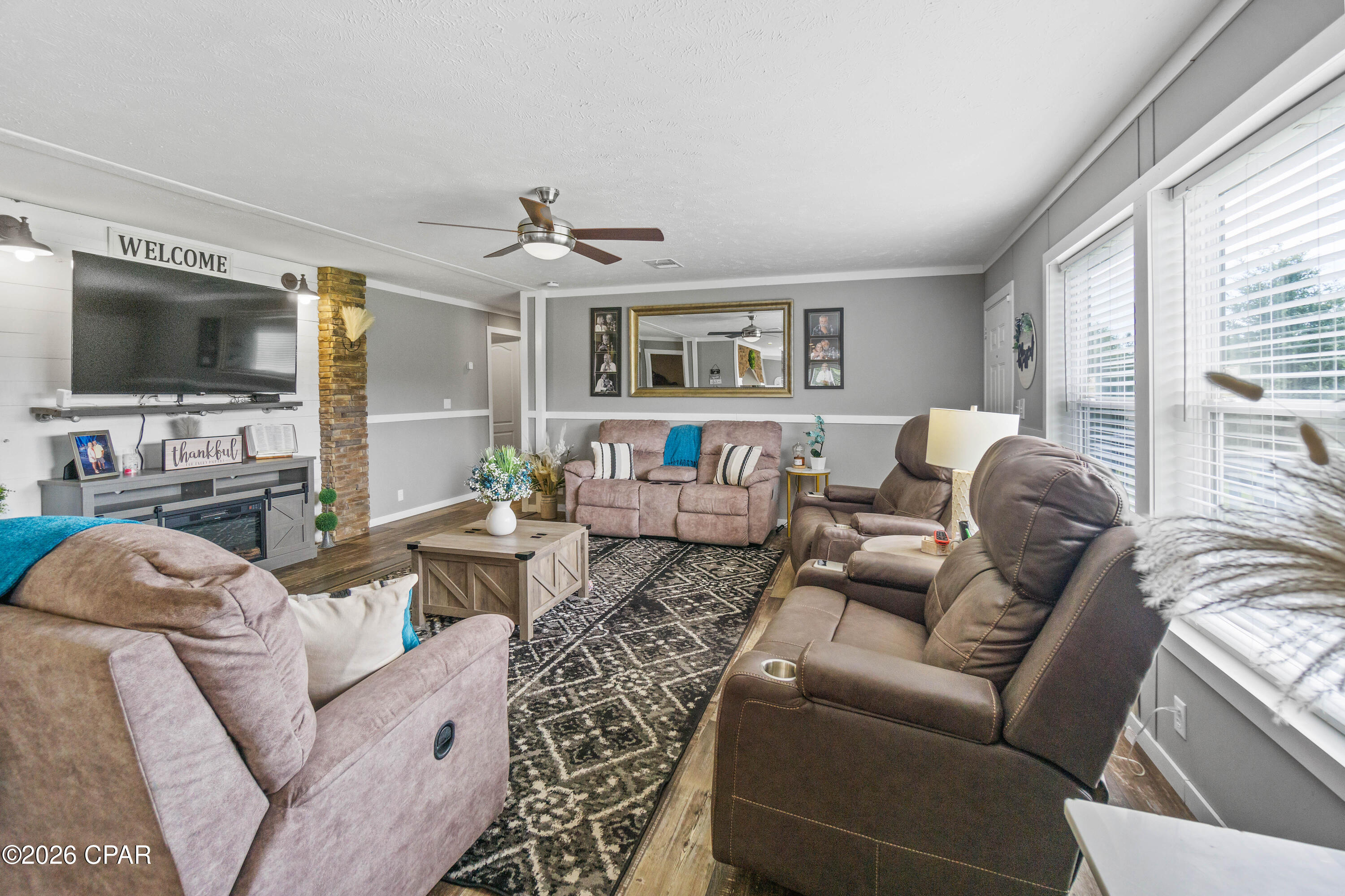 Discover this beautifully maintained 4-bedroom, 2-bathroom home offering 2,046 heated and cooled square feet, with the expansive covered patio bringing the total living space to 3,366 square feet. Built in 2022, this turn-key property sits on a peaceful 2.67-acre parcel and is being sold partially furnished, including appliances, washer/dryer, and additional items to make your move effortless.

Step inside to an open-concept layout featuring a spacious kitchen with a large center island and abundant counter space perfect for entertaining family and friends. The primary suite is a true retreat, boasting a large walk-in closet plus a luxurious tiled master bath with a separate shower and soaking tub. The additional three bedrooms provide flexible space for guests, a home office, or hobbies.

Outside, enjoy the huge, covered patio ideal for year-round outdoor dining and relaxing, along with a covered above-ground pool complete with a surrounding deck for your private backyard oasis. A storm shelter equipped with power and comfortable furnishings offers peace of mind, while the whole-home Generac gas-powered generator ensures comfort during any weather event. Solar panels on a durable metal roof are included, with the seller paying them off at closing. Additional highlights include covered detached parking perfect for an RV or boat, multiple storage buildings throughout the property, and a convenient gravel circular drive for easy access.

This low-maintenance, energy-efficient home combines modern comforts with practical features that make everyday living enjoyable. Whether you're looking for a primary residence or a weekend getaway, this property delivers.

Located in a quiet, country setting yet conveniently close to amenities, you're less than 30 minutes from Chipley, FL, where you'll find shopping, grocery stores, pharmacies, a hospital, hardware stores, and great local restaurants. Relax on the sugar-white sands of Panama City Beach in under an hour.

This rare combination of newer construction, acreage, solar power, backup generator, storm shelter, pool, and abundant storage is truly hard to find. Don't miss your opportunity to own this move-in ready slice of Florida paradise.