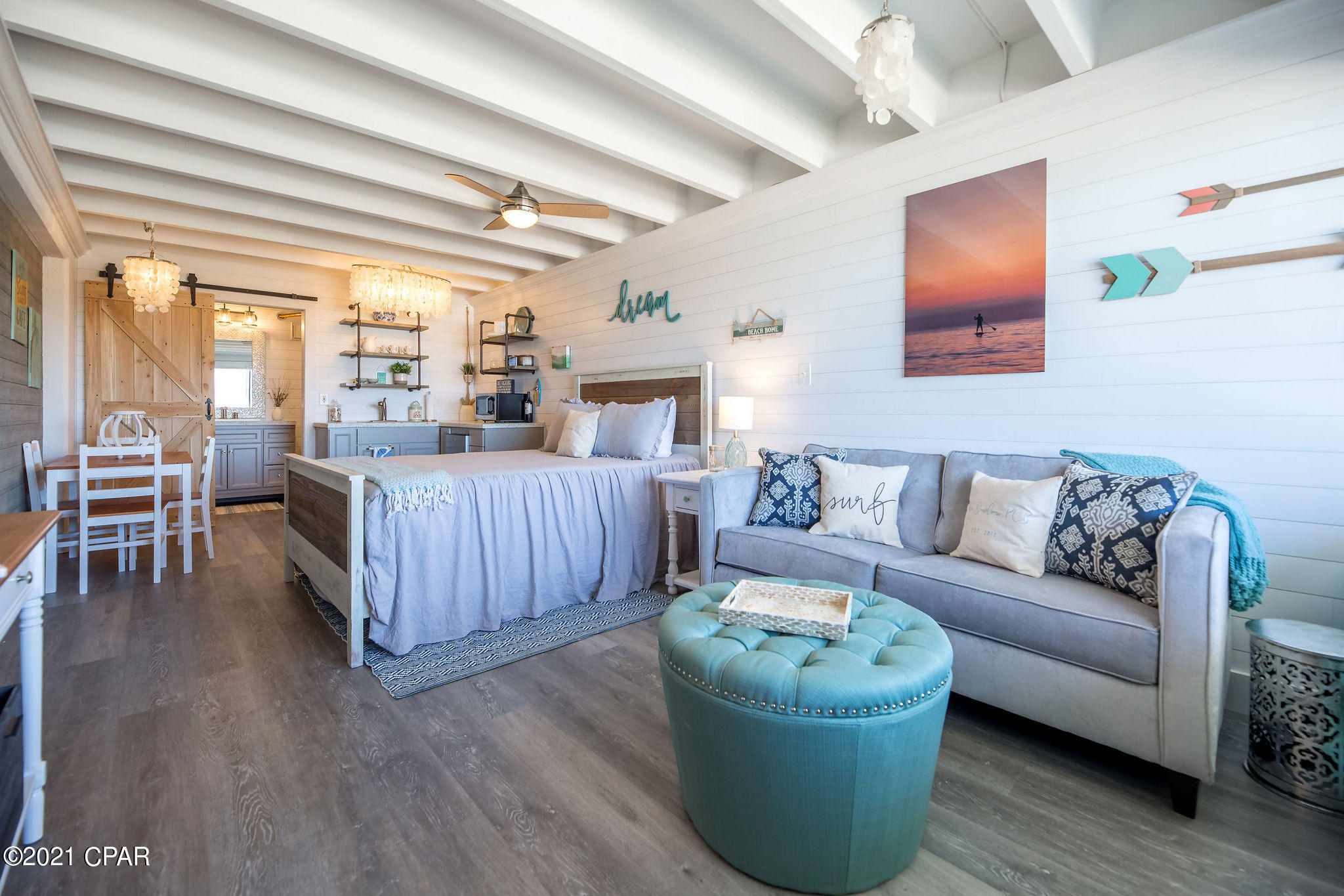 Probably one of the last opportunities to get Gulf Front, on the sand, for less than 200k!! This is one of the nicest, if not THE nicest unit in the entire building, every inch of this condo has been given attention. Redesigned and decorated by a professional interior designer, complete remodel includes - Vaulted ceilings, crown molding, LVP flooring, shiplap walls, custom polished concrete countertops with a little history sprinkled in, high end tiling in shower, open shelving, barn door leading to bathroom, custom lighting... this unit has it all!  Overlooking the newly remodeled pool, your Gulf views from the living room are unobstructed and stretch to the East over 1 mile of uncrowded beach. Condo has been a vacation rental over the last four years and has an excellent rental history approaching nearly 40k per year in gross rental revenues. Don't worry about bills as your HOA fees include everything, even electric! Fontainebleau Terrace is experiencing a bit of a renaissance with many owners remodeling individual units and a newly remodeled pool and decking area. Truly one of the best, this unit is a must see - schedule your showing ASAP!