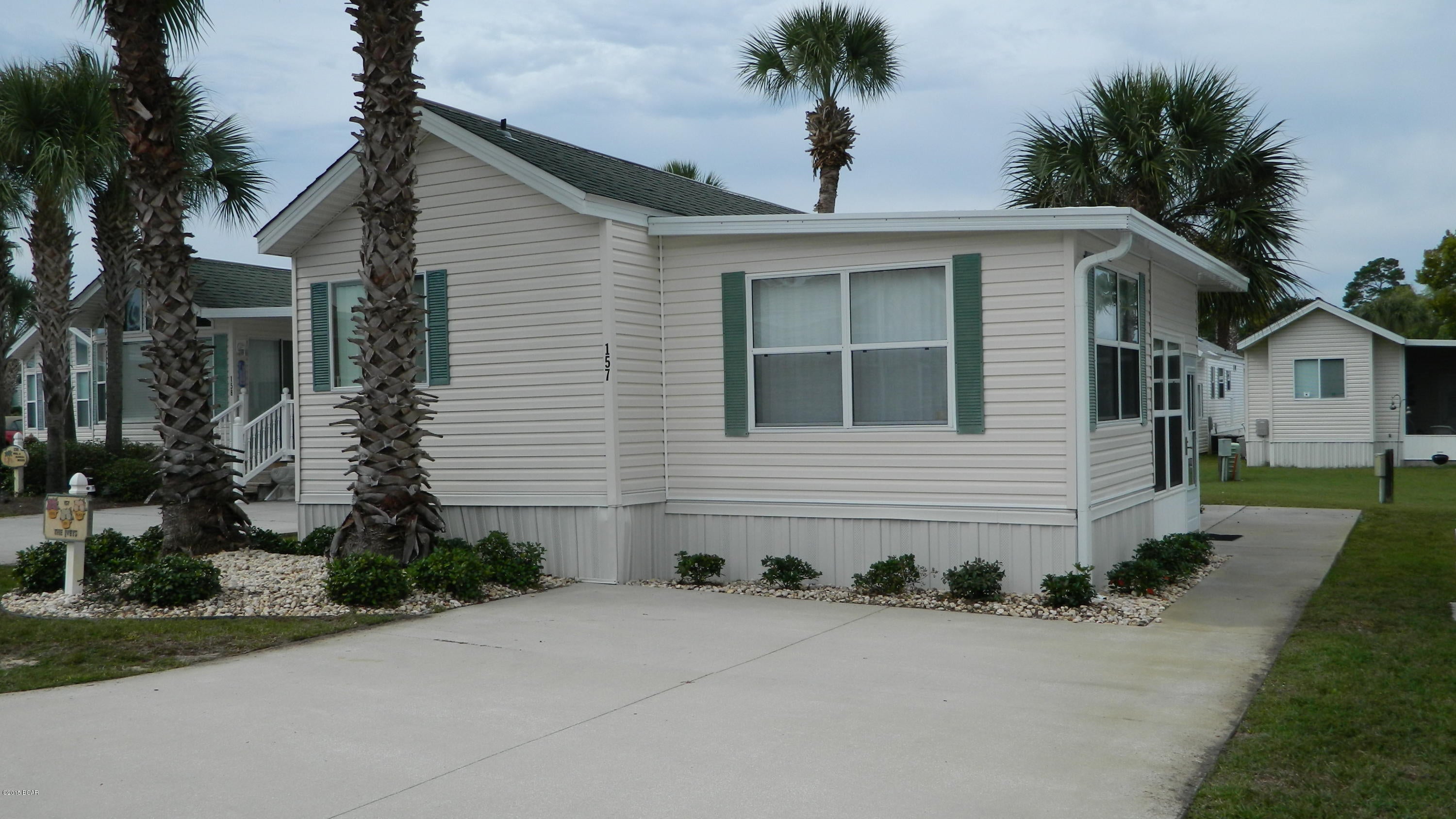 2 bedroom, 2 bath furnished unit that is conveniently located off Thomas Drive in the gated community of Emerald Pointe Resort. The living room offers a sleeper sofa and has direct access to the Florida Room. There is a high-top table with chairs and an additional dining room table with chairs. The master bedroom has a queen bed, built-in drawers and closet to maximize storage space. The attached bathroom has a stand up shower. The second bedroom has a full bed and attached bathroom with tub/shower combo. The resort has two pools, exercise room, clubhouse and playground. Basic cable, water, sewer, garbage included. **1 pet under 24lb negotiable with $250 non-refundable pet fee.