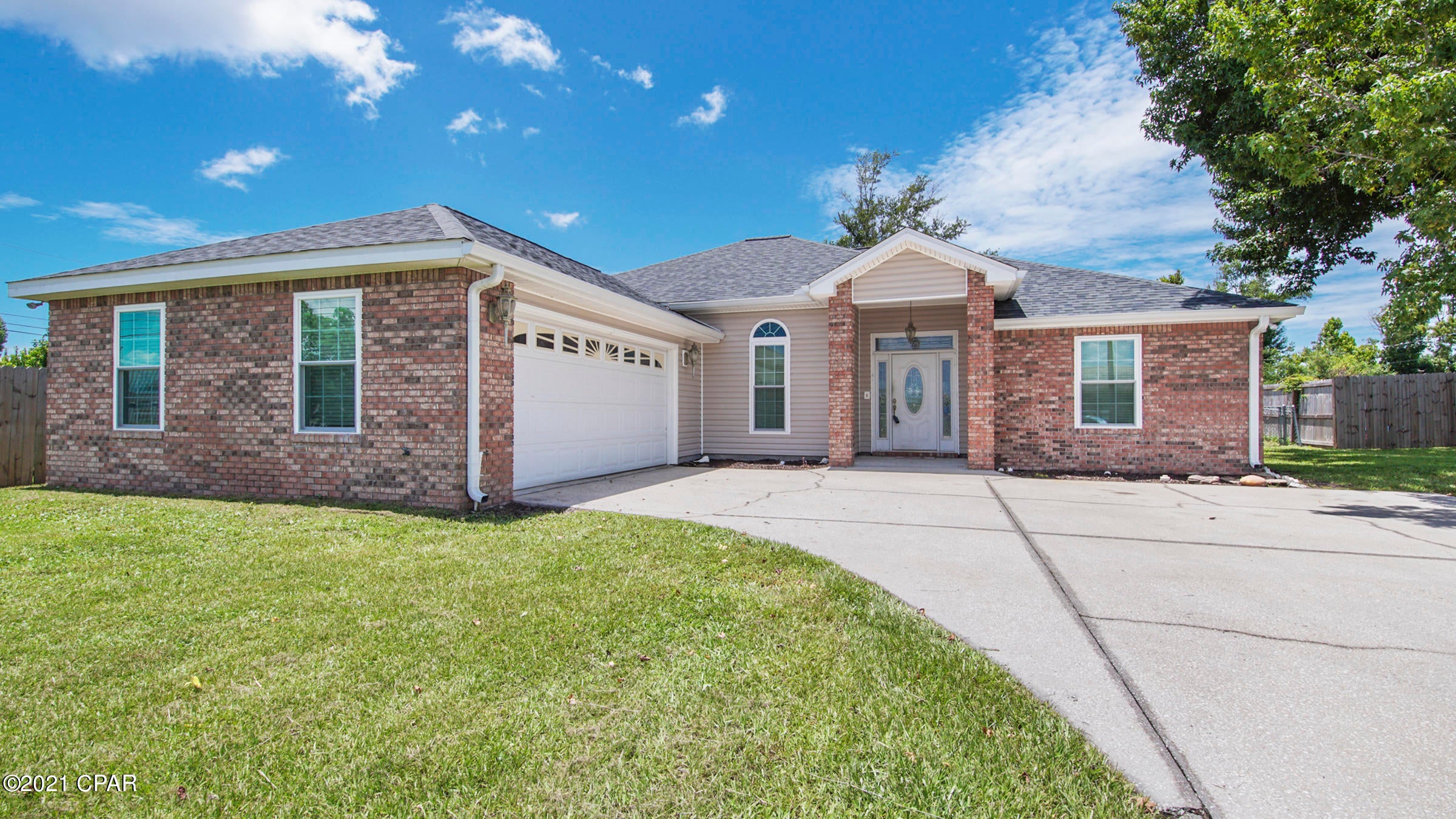 BEAUTIFUL HOME NEAR TYNDALL AFB! The interior features 3 bedrooms, 2 full baths, a tastefully designed floor plan with split bedrooms (great for entertaining), 2 dining areas, a good size living room with vaulted ceiling, an interior laundry room and an oversize 2 car garage. The kitchen boasts solid surface counters, stainless steel appliances, and 2 pantries. The master bedroom can accommodate king size furniture and has an adjoining master bath with shower/tub combo and a large walk-in closet. The other two bedrooms are good size and share the hall bath. The exterior features a screened back porch, an open back patio, a storage shed and a mostly fenced backyard.  X Flood Zone. No HOA! Call today for a private preview. Measurements approximate.