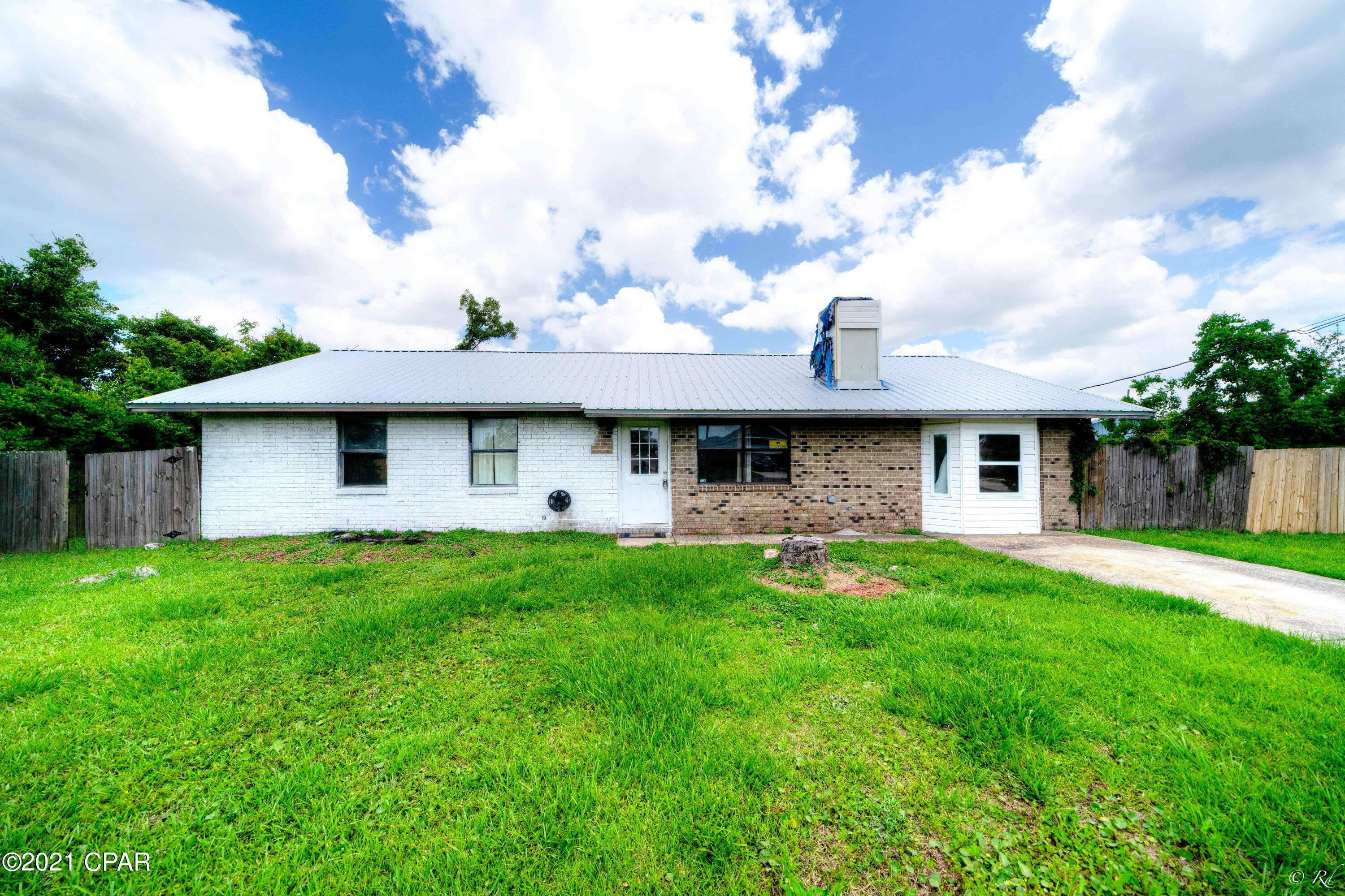 3-bedroom 2 bath brick home centrally located off of East Ave. The home features a large living area with a fireplace and a large kitchen, fenced back yard with a patio and pool. Home has a new roof. Home is in need of repair.  Ceiling needs repair, Drywall work needed and painting.  All measurements are approximate. Please verify if important