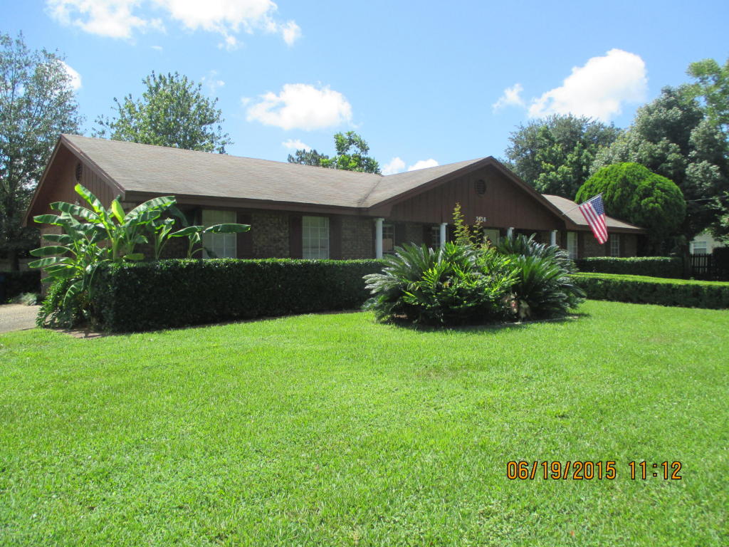 This is a cozy ONE owner home on a gorgeous corner lot in a nice subdivision that is immaculate and well-cared for! This 3 bedroom 2 bath home has almost 1400 square feet and is perfect for a starter home or someone looking to downsize but enjoys taking care of and enjoying a beautiful yard. The kitchen has recently been remodeled with new counter tops and appliances.The kitchen also features large breakfast bar, pantry and flows into a formal dining area and has an open feel to the family room. The family room has a beautiful brick fireplace that is electric but can easily be converted back to a wood burning fireplace. There is a screened porch off of the family room that is perfect for your morning coffee and overlooks the beautiful backyard and landscape.