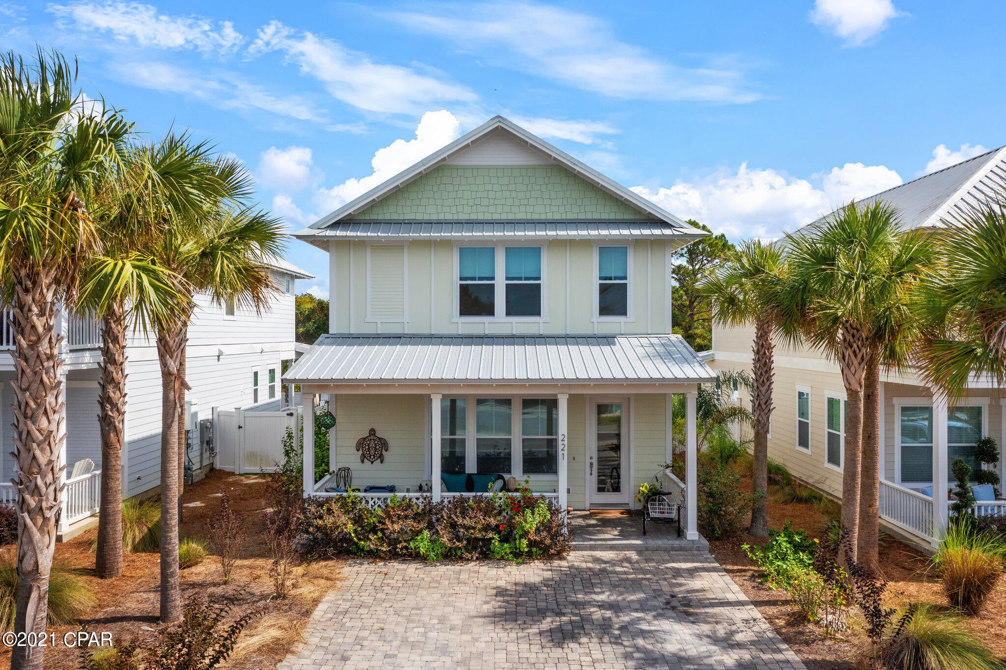 The perfect money machine on the much desired West End of Laguna Beach! No need for a golf cart here! These beautiful beach style homes are located only steps to the emerald waters of the Gulf of Mexico. Rare opportunity house backs up to watershed, a permanent green space! The perfect location, near Pier Park shopping, restaurants, 30A, and the airport. These homes feature metal roofs, hardie board siding, double French doors, high impact/hurricane windows and doors, paver driveways, outdoor shower, tankless gas water heaters and gas ranges, with a lock-out storage room that is heated and cooled. This home also features a custom pool built by Cox Pools.