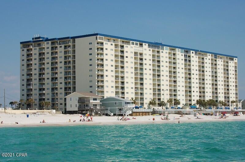 Regency Towers is a Gulf  Front condominium well established and loved by both owners and vacationers. This ground floor 3 bedroom unit on the East side of Regency Towers is being offered at $429,000.   There is no wait for an Elevator! The entry door and interior door keeps a/c costs down.   All tile floors make for easy maintenance.   Quality kitchen appliances were installed since 2018.  The private patio is great place to enjoy morning coffee and evening cocktails.   With 3 bedrooms and 2 full baths, there is plenty of room for living.