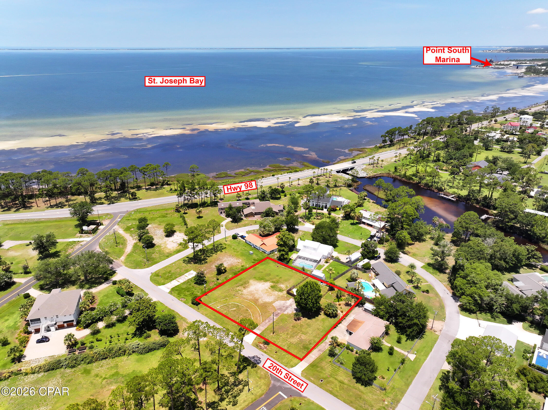 Rare opportunity to own two adjoining lots in the heart of Port St. Joe! Offering incredible flexibility, these properties are being sold together but could be divided, making them ideal for a custom estate, investment opportunity, or future development. A newly constructed home would enjoy beautiful views of St. Joseph Bay, where breathtaking sunsets paint the sky each evening. A unique bonus is the existing gunite in-ground swimming pool, providing an excellent foundation for your backyard oasis while you build. Located just minutes from downtown Port St. Joe, you'll love the convenience of hopping on your golf cart to explore local boutiques, restaurants, coffee shops, and live music venues. Spend your days enjoying the charming coastal atmosphere, fishing, boating, and the laid-back lifestyle that makes the Forgotten Coast so special.