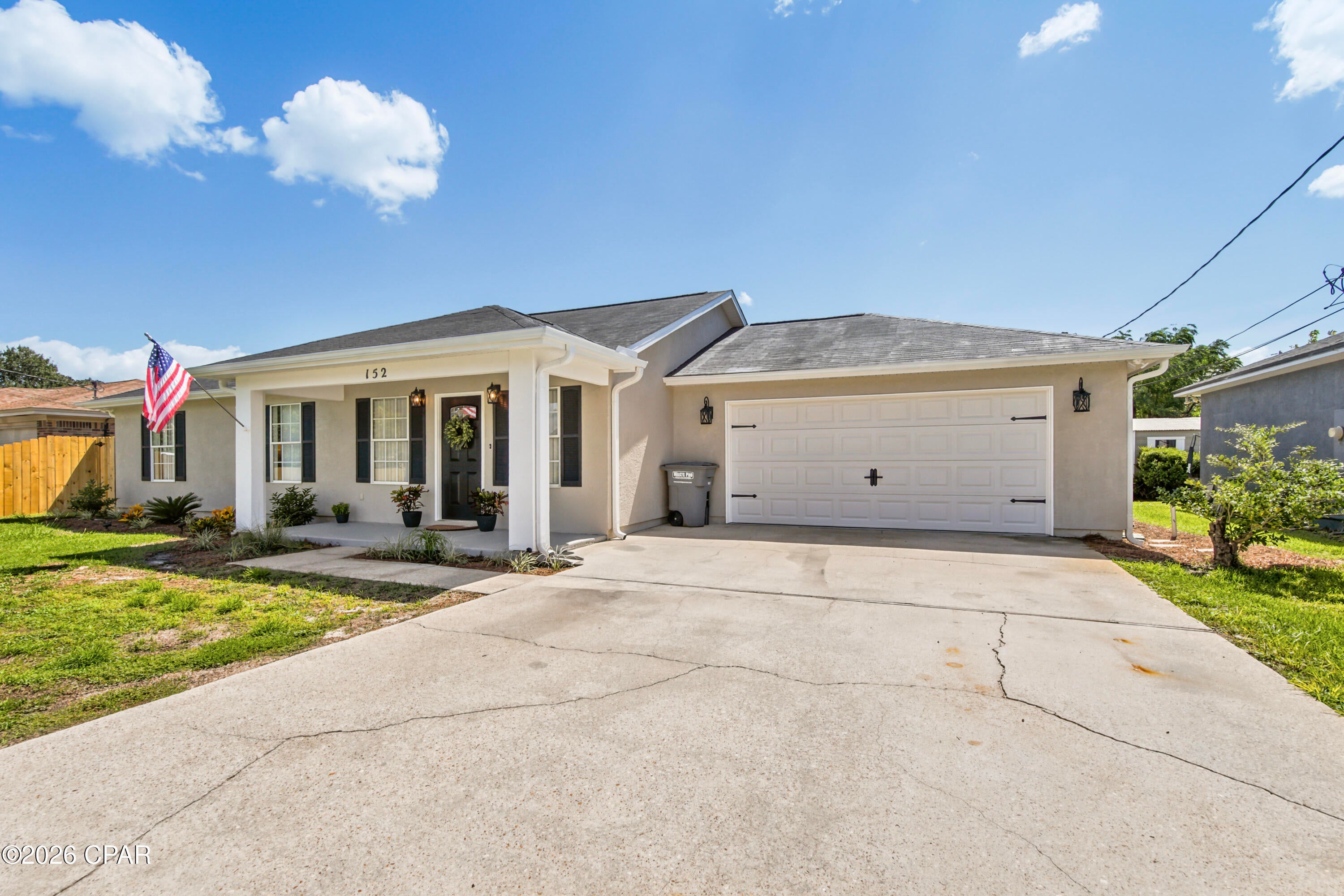 Welcome to 152 Manistee Drive, a beautifully remodeled 3-bedroom, 2-bathroom home offering 1,344 square feet of updated living space, a two-car garage, paid-off solar and no HOA.

Step inside to an open and spacious living and kitchen area featuring vaulted ceilings, all-new flooring, fresh interior paint, granite countertops throughout and brand-new Samsung stainless-steel appliances. New interior lighting, plumbing fixtures and toilets complete the home's clean, modern look.

The spacious primary suite includes a walk-in closet and private bathroom with a jetted tub, separate shower and double-sink vanity. A large screened porch provides the perfect place to relax, enjoy morning coffee or entertain friends and family.

In addition to the home's 1,344 square feet of reported living area, the property features a 528-square-foot finished, insulated and climate-controlled two-car garage with a new insulated garage door. The garage is separately classified by the Bay County Property Appraiser and is not included in the home's reported living square footage, providing valuable year-round flexibility for parking, a workshop, home gym, hobby area or additional storage.

The improvements continue outside with new exterior doors, new exterior lighting, a new privacy fence, updated irrigation and all-new landscaping. A powered 10 x 12 storage building provides even more space for tools, lawn equipment, beach gear or a small workshop.

Another standout feature is the fully paid-off solar-energy system with FPL net metering. The new owner can enjoy the benefits of solar without assuming an outstanding solar loan or monthly equipment payment.

Conveniently located on the west end of Panama City Beach near Highway 79, Pier Park, Northwest Florida Beaches International Airport, shopping, dining, and just a five-minute drive to the beautiful white-sand beaches of the Gulf of America.