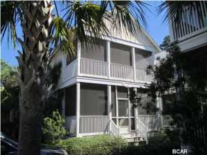 Barefoot Cottages - Bayside living in a gated community with turn key living at its best at a great price. Two pools, hot tub, playgrounds, grilling areas, community center with exercise equipment, grounds keeping and much more. Unit is complete with stainless appliances, washer and dryer, hardwood floors downstairs and ready to go. Each bedroom has an en suite private bath and the upstairs master has its own screened in porch/balcony. You'll also enjoy the screened in porch downstairs off the living area. All dimensions taken from the Gulf County Property Appraiser's website and deemed reliable. **Buyer Rebate up to $2,000 on this unit. Some restrictions may apply. Contact Listing Agent**