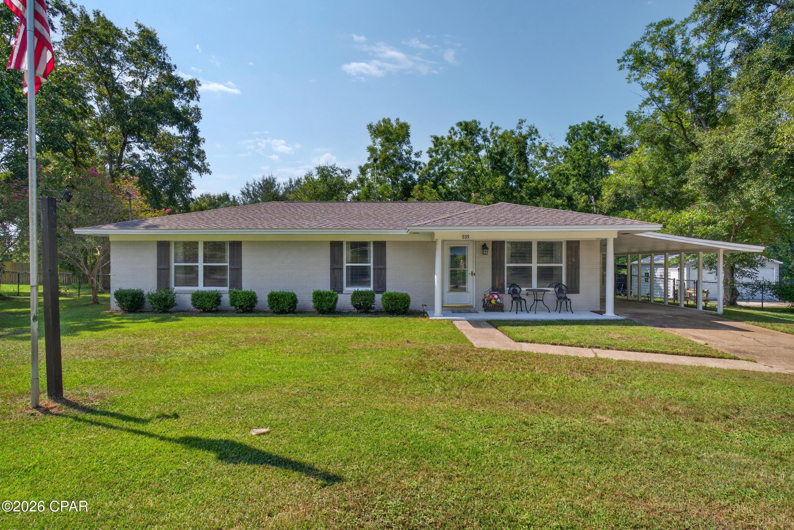 CURRENTLY UNDER CONTRACT, SELLER WILL CONSIDER BACKUP OFFERS
Imagine the love a home is given when it is cared for by the same family for 51 years. That's exactly what you'll find here. Sitting on 1.16  acre down a quiet street on the outskirts of Bonifay, this home has been in the same family for multiple generations. From the well manicured lawn to the updated interior, you can tell pride was taken over the years. It's a desirable construction featuring a brick exterior and slab foundation. Don't let the size of the home fool you, it's got everything you need and more. The roof was replaced in 2022, HVAC 2018, and water heater around 2019. Step inside and you'll notice LVP flooring, elevated trim, fresh paint and updated fixtures. The bathrooms have been updated to include tile flooring, cabinetry, showers/tub, PVC/PEX plumbing, and Quartz countertops. More features include kitchen updates such as stainless appliances, countertops, backsplash, and cabinetry. For parking, there is an attached carport and a separate detached 2-car garage with electricity and a water hook up. Overlook your spacious, fenced backyard from your screen-in porch and cool off after a hot day of yard work in the outdoor shower. The 2 bay pole barn is perfect for storing lawn equipment or your outdoor toys.  The laundry room is located just off the dining room and walks out to another screened in porch to sit and enjoy. With over 10 pecan trees on the property, I hope you like baking pie! Utilities are public water and septic tank. This property is only a couple of minutes off of Interstate-10 and Highway 79, making it convenient for those who have to commute. Panama City Beach is less than an hour away directly down Highway 79!