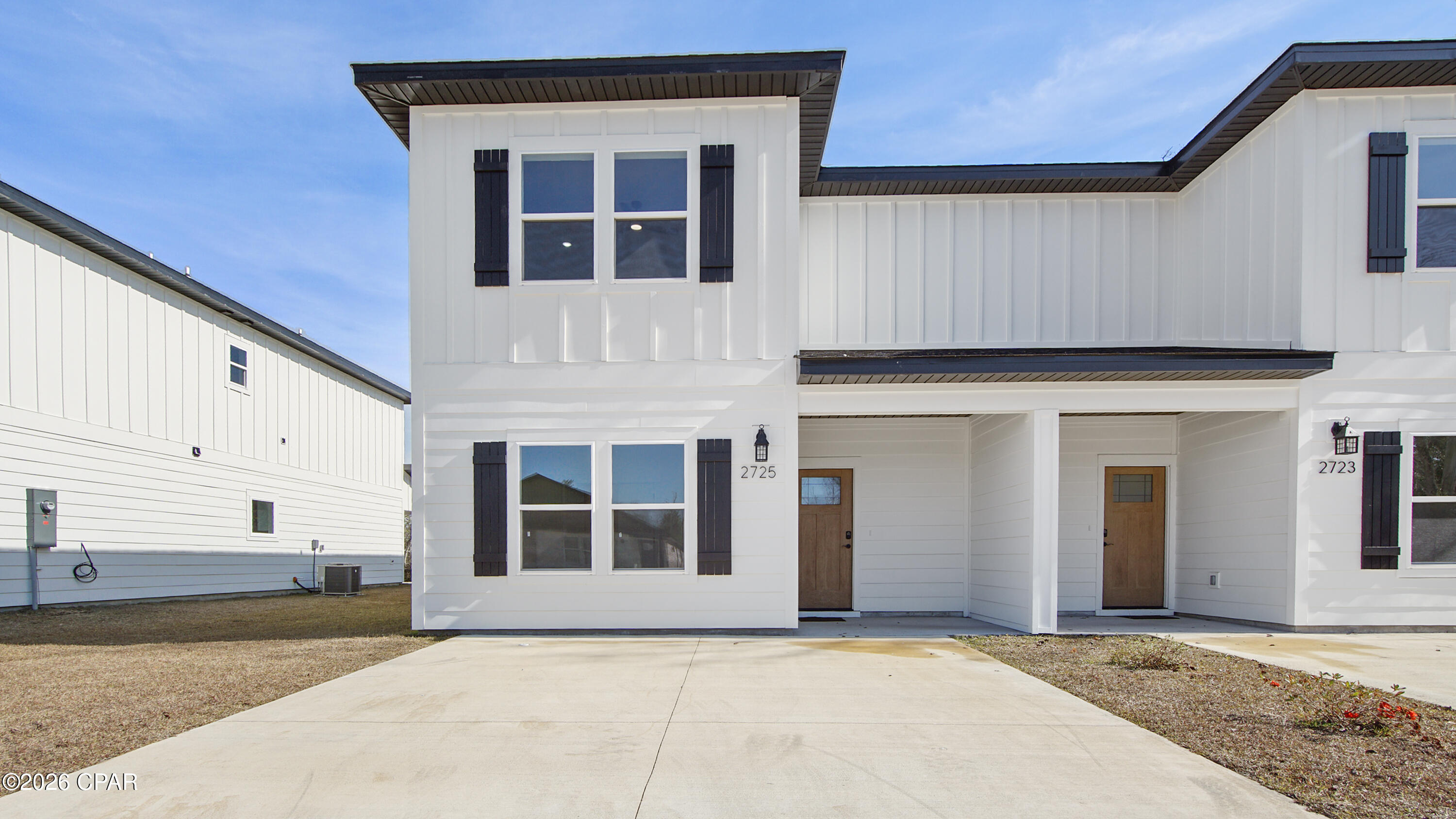 Looking for a new construction home in Panama City, FL with no HOA and short-term rentals allowed? This beautifully designed townhome offers the perfect combination of modern style, low-maintenance living, and investment potential. Whether you're searching for a primary residence, vacation home, Airbnb, or long-term rental property, this home checks every box. Conveniently located just minutes from Highway 231, you'll enjoy quick access to shopping, grocery stores, restaurants, schools, medical facilities, and everyday conveniences. Tyndall Air Force Base is only 18 minutes away, while the white-sand beaches of Panama City Beach are approximately 20 minutes from your doorstep. Unlike many townhomes, this spacious floor plan lives like a single-family home with an open-concept layout designed for both entertaining and everyday living. Luxury vinyl plank flooring flows throughout the main living areas, creating a seamless, modern look with easy maintenance. The chef-inspired kitchen is the heart of the home, featuring white shaker cabinetry with soft-close drawers, quartz countertops, stainless steel appliances, a large center island with bar seating, and a generous walk-in pantry--perfect for hosting family and friends. One of the home's standout features is the rare first-floor bedroom with direct access to a full bathroom, making it ideal for guests, multi-generational living, or a private home office. The spacious living and dining areas flow effortlessly to the covered back porch, providing the perfect space for relaxing, grilling, or enjoying Florida evenings. Upstairs, the private split-bedroom layout offers exceptional comfort. The oversized primary suite measures approximately 13'7'' x 15'8'' and features a large walk-in closet and a beautifully appointed en-suite bathroom with dual vanities and quartz countertops. Two additional generously sized bedrooms, another full bathroom, and a conveniently located upstairs laundry room complete the second floor. Built for lasting quality and energy efficiency, this home includes Hardie® Board siding, a Rheem® tankless water heater, a fully sodded yard, a one-year builder warranty, and a 10-year structural warranty, providing peace of mind for years to come. With no HOA, short-term rentals permitted, premium finishes, and an unbeatable location near Tyndall Air Force Base, Panama City Beach, and Highway 231, this move-in-ready new construction home is an outstanding opportunity for homeowners and investors alike.