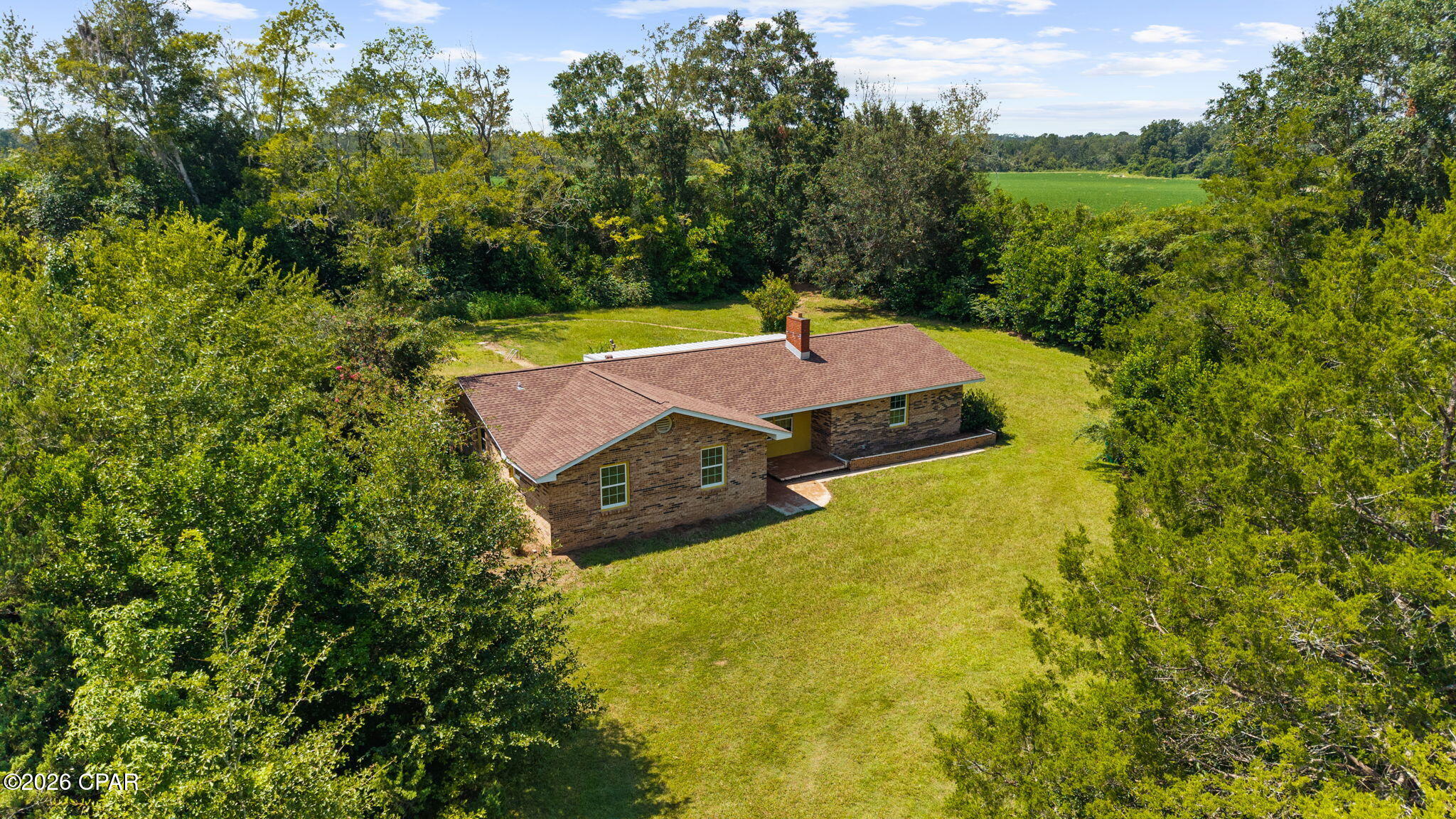 Peace, privacy and plenty of space!  This completely renovated, all brick home sits on 5 acres offering the perfect blend of country living and modern updates.  This property features a spacious home with brand new LVP flooring throughout, new kitchen countertops and new stainless-steel appliances. New roof. The expansive acreage provides endless possibilities for gardening, recreation, animals or simply enjoying the privacy and natural surroundings.  Whether you're looking for a peaceful homestead, room to spread out, or a property with potential this 5-acre retreat is worth seeing.