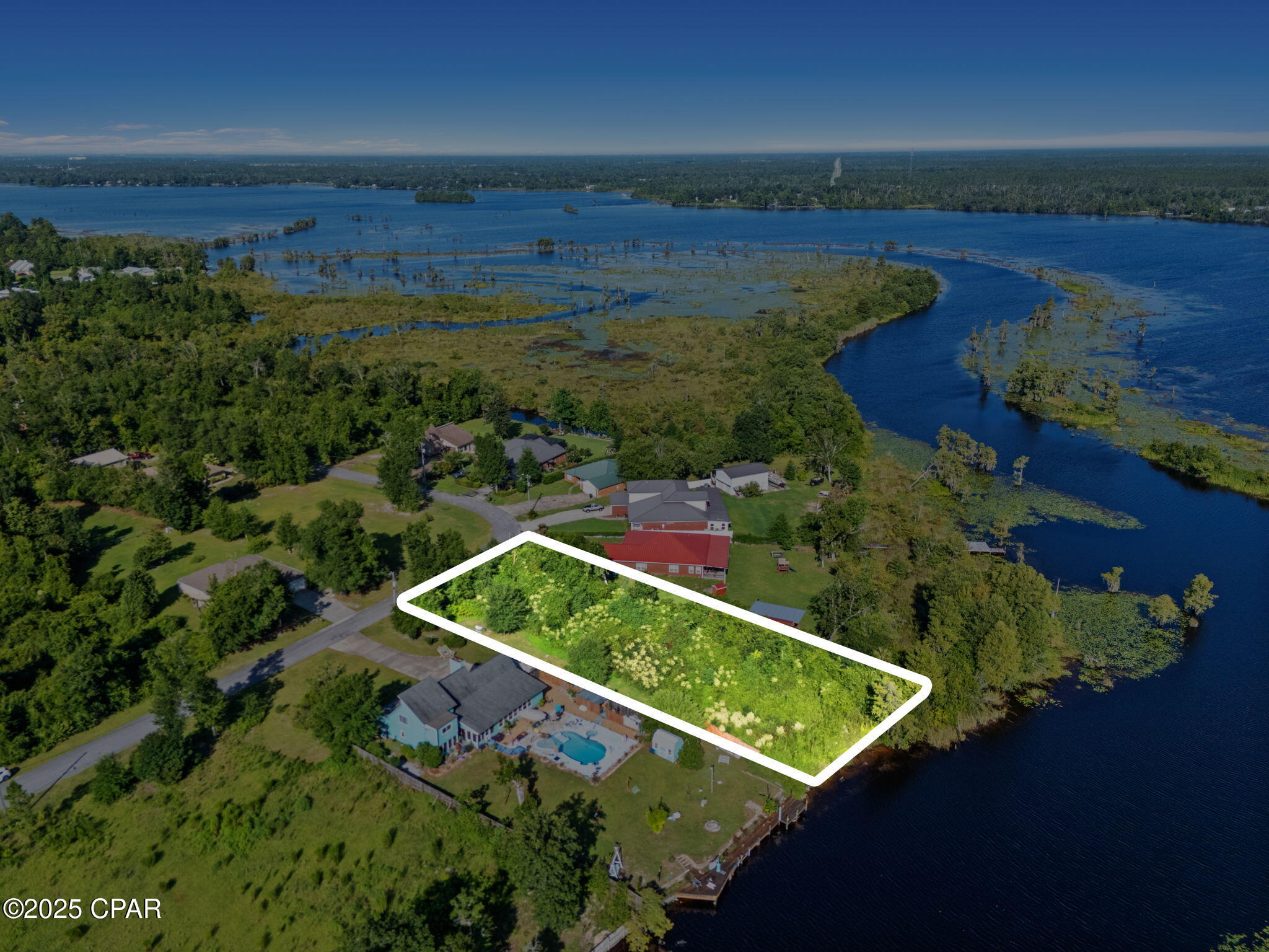 Build your waterfront dream home or enjoy a peaceful private retreat on this partially cleared 0.568-acre lakefront lot with 100 feet of direct frontage on Deer Point Lake, a well-loved Northwest Florida destination known for fishing, kayaking, and relaxed waterfront living.

Situated in a quiet, established area with no HOA restrictions, this property offers the freedom to build at your own pace and create something that fits your lifestyle today and for years to come. Whether you envision a full-time residence, a weekend getaway, or a long-term investment, the possibilities here are wide open.

Enjoy the calm and privacy of lakefront living while still being just a short drive from Panama City's dining, shopping, and entertainment, as well as the area's beautiful white-sand beaches. Opportunities like this offering waterfront access, flexibility, and room to grow don't come along often.