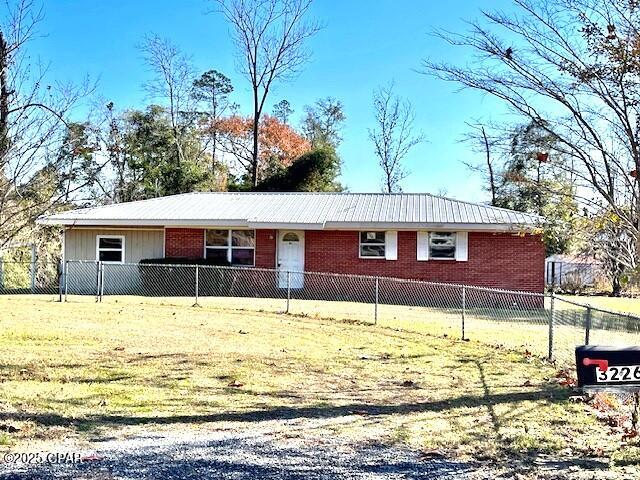 NOW IN AUCTION. through auction.com.  NEW AUCTION DATES 8/2 to 8/5  HOME & 2.26 ACS. in Dogwood Heights just north of town.  Home  features a large living room, 3 bedrooms snd 2 baths.  There is a bonus room with exterior and interior access.   A small sun room overlooks the back yard.  The property has chain link fencing and a metal roof.  The location is ideal for the family with children as it is near the new Marianna High School and the new Marianna K-8- school.  Also Sunland, Marianna Industrial Park and the Marianna Airport is just a few minues away.  With some repairs and updaes yu will have a lovely home to enjoy for years.