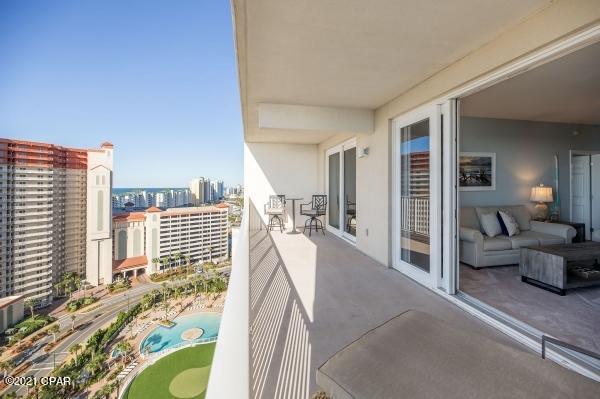 Private balcony with amazing views of the gulf. Steps away from the beach, shopping, dining and entertainment. Laketown Wharf resort amenities include  five pools with one pool just for kids, fitness center with gulf views, putting green, parking garage, nightly fountain and light show. This condo includes 2 bedroom, 2 bathrooms and a bunk room. All furniture and appliances are less than a year old. Short term rentals through August some in September and October can transfer to the buyer.