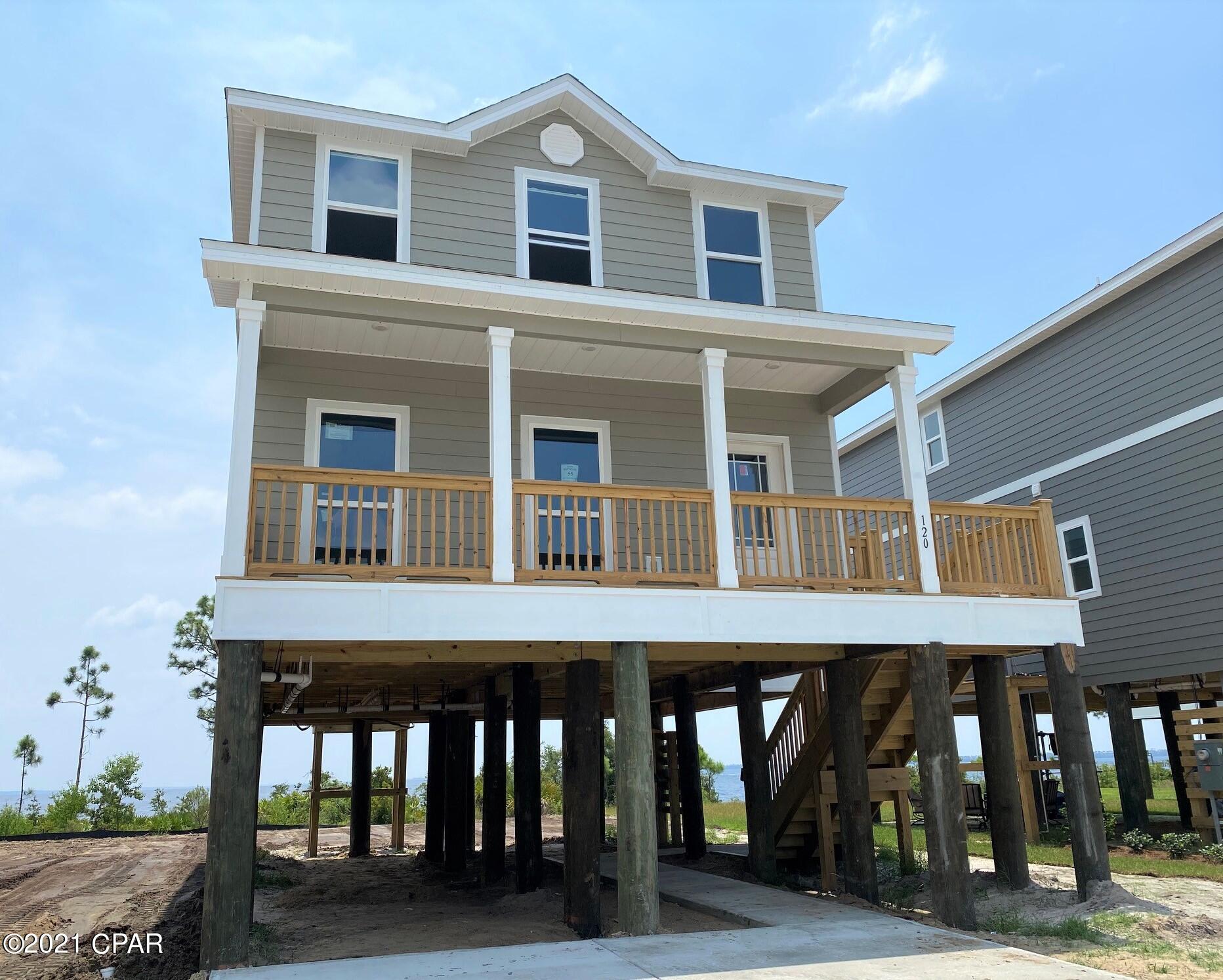 Welcome to Bridge Harbor! The Ole Southside is a two story floor plan featuring a large front porch, 3 bedrooms, and 2 ½ bathrooms with spectacular WATERFRONT views! As you enter the first floor, the large family room opens up to the formal dining room and hall featuring a half bath and coat closet. The kitchen has a spacious pantry and separate breakfast area with access to the back porch. The second floor hall leads to a laundry closet, and bedroom 1 that has a walk in closet and private bath with a linen closet, dual sinks and a separate shower and tub. The second and third bedrooms each have large closets and the hall connecting to the second full bath that features a linen closet and shower/tub combo. Conveniently located near shopping, dining, Tyndall Air Force Base, and a short drive to the white-sand beaches and turquoise
seas. This community is the perfect place to call home!

A standard Smart Home package includes a KwikSet keyless entry, Skybell doorbell, automated front porch lighting, an Echo
Dot device, and Quolsys touch panel which can be integrated to control your lighting, thermostat, front door and so much more.
A builder 10 year structural warranty is also included.

Pictures, photographs, floor plans, elevations, features, colors and sizes are approximate for illustration purposes only and will
vary from the homes as built. Home and community information including pricing, included features, terms, availability and
amenities are subject to change and prior sale at any time without notice or obligation. For Move-In/Completion Estimates:
Ready dates are estimates only. Timing of completion of construction and buyer move-in are subject to contingencies
contained in home purchase agreement and governing jurisdictions issuance of a certificate of occupancy, and may change
due to forces majeures and other delays or disruptions outside the reasonable control of the Builder.