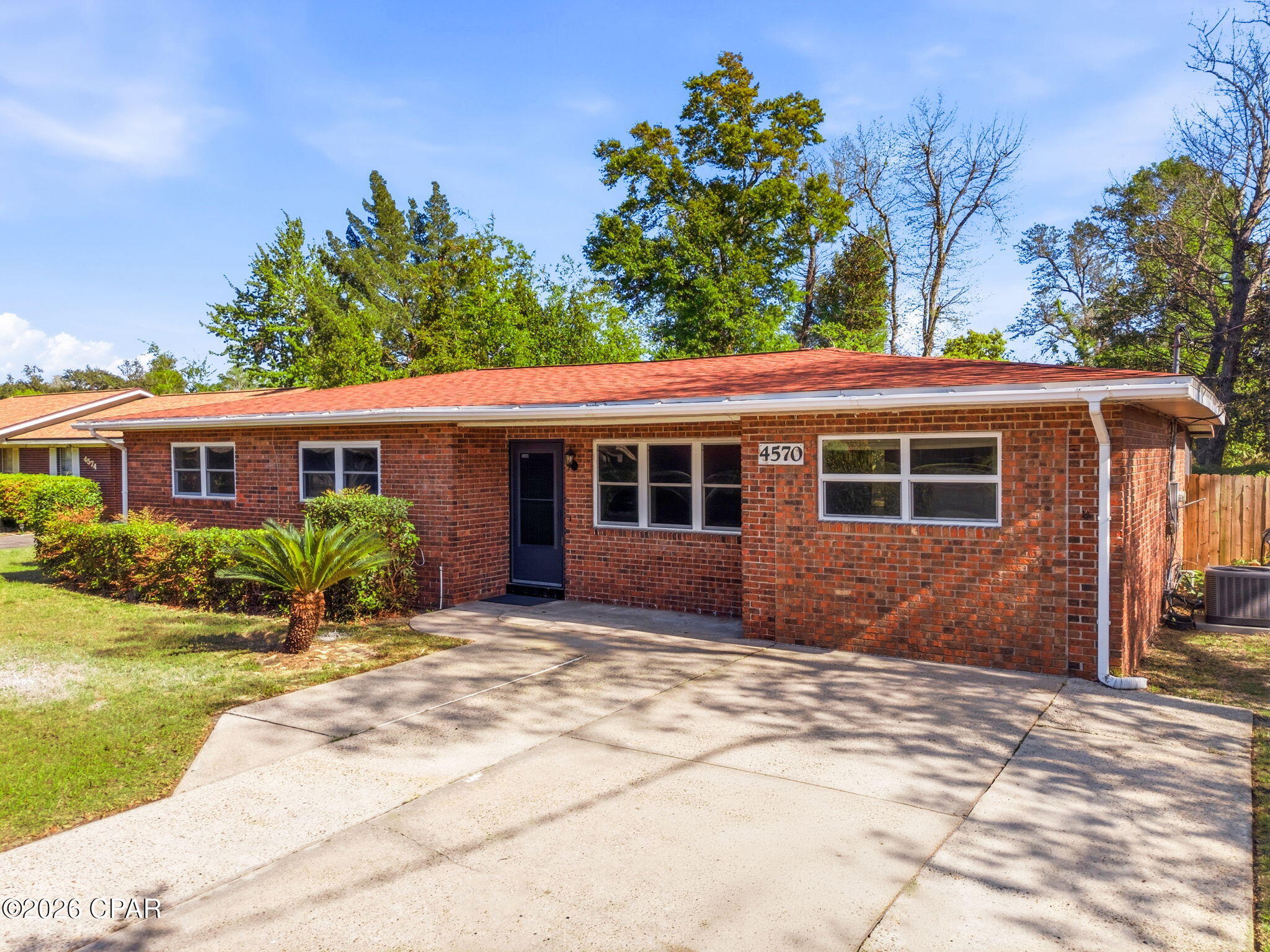 'CURRENTLY UNDER CONTRACT, SELLER WILL CONSIDER BACKUP OFFERS' 
Welcome to this beautifully maintained 4-bedroom, 2-bathroom brick home offering comfort, functionality, and a prime location close to some of Bay County's best amenities. Recently painted, one room has carpet and it is brand new, with vinyl plank through out the rest of the home, this home feels fresh, clean, and move-in ready from the moment you step inside.

The thoughtfully updated kitchen serves as the heart of the home, featuring modern finishes, retro oven, ample cabinetry, and a layout that flows seamlessly into the main living areas--perfect for both everyday living and entertaining. while touring this home take note of the ample sized bedrooms, slightly larger then average. an oversized utility room, and an oversized rear sliding glass door that faces south offering all dat sun exposure. Natural light fills the spaces, enhanced by the fact that most of the windows have been replaced, providing improved efficiency and a bright, welcoming feel throughout.

The spacious primary suite offers a peaceful retreat and includes a well-designed closet complete with built-in shelving, providing excellent organization and storage. Three additional bedrooms offer flexibility for family, guests, or a home office setup.

Step outside and enjoy your own private outdoor oasis. The large screened-in back patio is perfect for relaxing or hosting gatherings year-round, while the fully fenced backyard offers both privacy and space. a storage shed for your yard tools, an RV gate for ample access for parking or moving large items to the rear of the home. Mature trees and established hedges add to the charm, creating a serene setting with natural beauty and shade. This home also features a newer roof, replaced in 2019, gutters, an oversized driveway for ample parking and an irrigation well (not currently in use) a 2016 HVAC system and so much more. 

Location is key, and this home truly delivers. Enjoy being just approximately 0.5 miles to a nearby park and 1 mile to the water, making it easy to take advantage of outdoor recreation, walking trails, and waterfront views. Whether it's morning walks, afternoon picnics, or sunset strolls, you'll love having these features so close to home.

Conveniently located just 6 miles to Tyndall Air Force Base, 20 miles to Northwest Florida Beaches International Airport (ECP), and approximately 18 miles to the white-sand beaches of Panama City Beach, this property offers easy access to work, travel, and some of the most beautiful beaches on the Gulf Coast.

Whether you're looking for a primary residence, investment opportunity, or a home close to both nature and convenience, this property checks all the boxes. Schedule your showing today and see all this home has to offer!