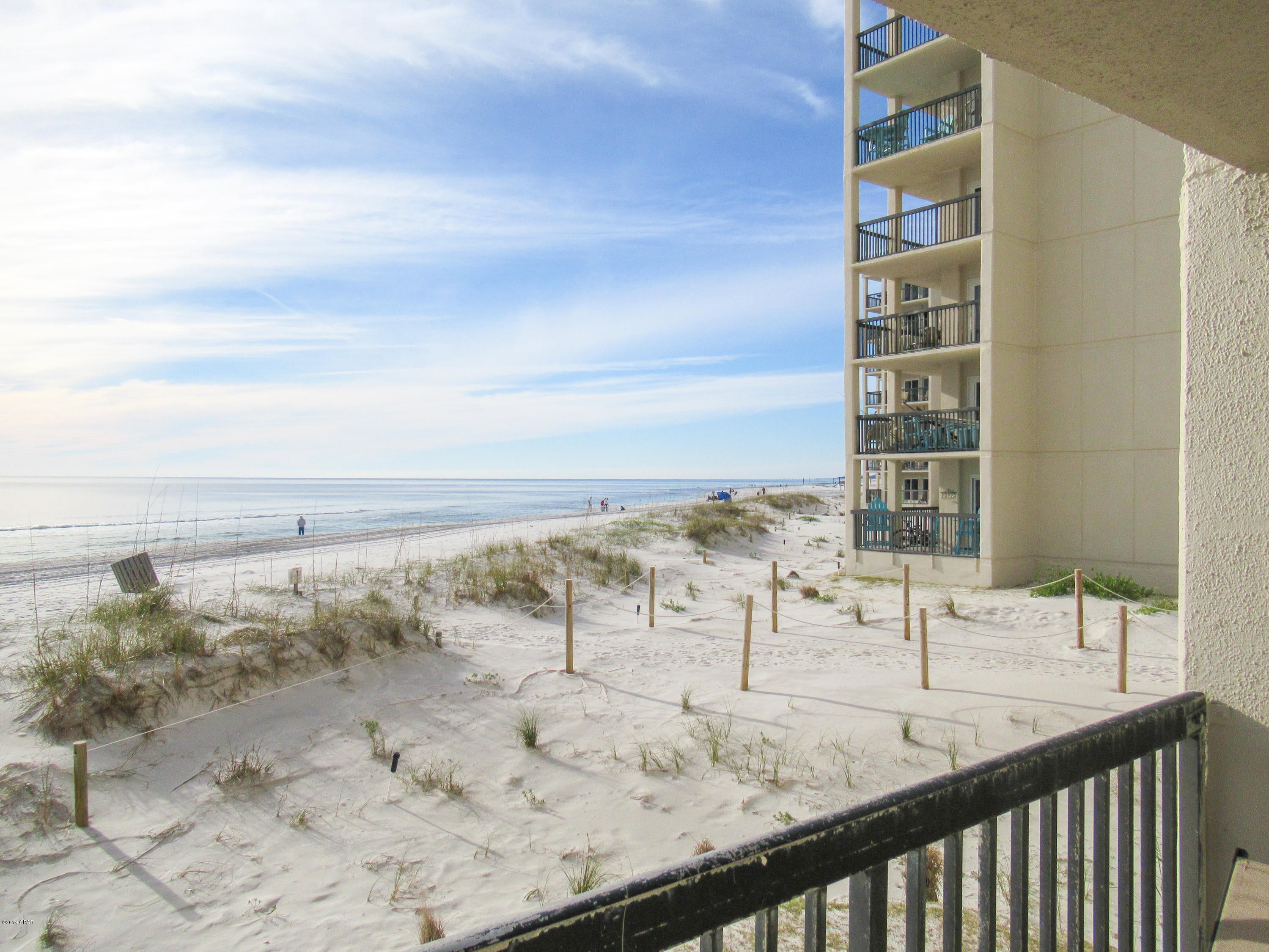 Steady rental income in this pristine 3 bed/3bath ground unit, right on the sand! Southerly & Easterly views of white, sandy beaches of the Gulf of Mexico. Westerly- state park, North- Lake Powell and state park. Unit comes fully furnished and equipped. Beautifully appointed, can easily sleep 8 plus. Maintenance Fees include electric for heating and cooling, hot water. Community amenities include, among others, indoor and outdoor pool, tennis court, playground, shuffle board, community center, and so much more. Come and see for yourself this spectacular and serene view. Buyer to verify that all information, including HOA/Condo association info, is accurate during due diligence period.