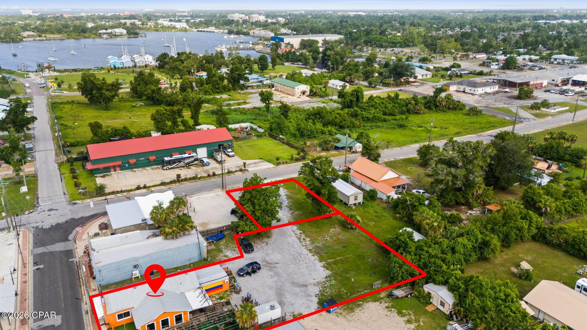 Your opportunity to own *** TWO PARCELS *** This mixed use zoning Combo deal offers an abundance of opportunity for your future commercial business or residential goals. 

Historic Mixed-Use Commercial Opportunity in the Heart of Panama City! 

Step into a piece of local history with this iconic commercial property located at 2117 E 3rd Street, Panama City, FL 32401. Originally built in 1925, this well-known landmark has been home to numerous successful businesses throughout the decades and continues to offer endless possibilities for its next owner.

Currently operating as a restaurant and drinks bar, this mixed-use zoned property features a highly functional layout with ample indoor seating, a commercial-style service area, and a one-of-a-kind outdoor gathering space designed for entertainment, fellowship, and social events. The inviting outdoor area offers a unique atmosphere rarely found in today's market, making it ideal for live music, game nights, private events, or expanded customer seating.

The building's size and footprint make it exceptionally well-suited for a variety of business ventures including a café, deli, coffee shop, brewery, wine bar, specialty restaurant, retail concept, creative workspace, or other mixed-use possibilities. Its historic charm, established presence, and strategic location provide the perfect foundation for entrepreneurs looking to bring their vision to life.

Whether you're an investor seeking a unique income-producing asset or a business owner ready to launch the concept you've always dreamed of, this property presents an incredible opportunity at an affordable price point. With its rich history, flexible zoning, distinctive character, and endless potential, this property may very well be one of the best commercial values currently available in Panama City.

Bring your vision, make your mark, and become part of the next chapter of this historic Panama City landmark