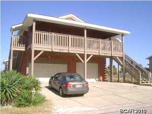 Unit has been completely remodeled, open floor plan, tile, carpet, across the street from the Gulf. Utilities included.