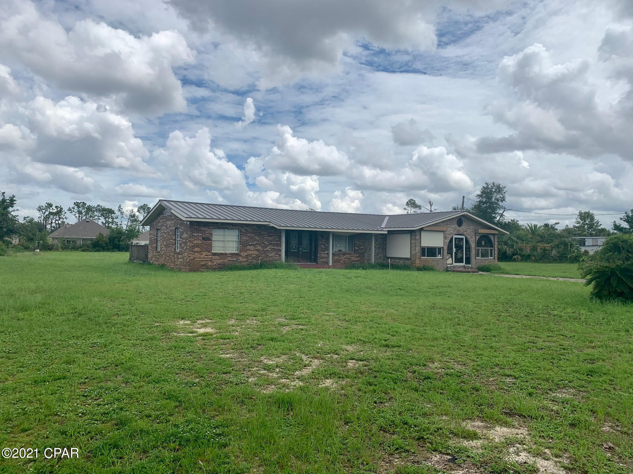 Excellent investor opportunity to restore a very large home to it's former glory. This 4 bed, 3 bath home sits on a 1.65 acre lot and is centrally located near some of Panama City's best neighborhoods. Home formerly had a separate mother in law suite. Property is zoned R-1.