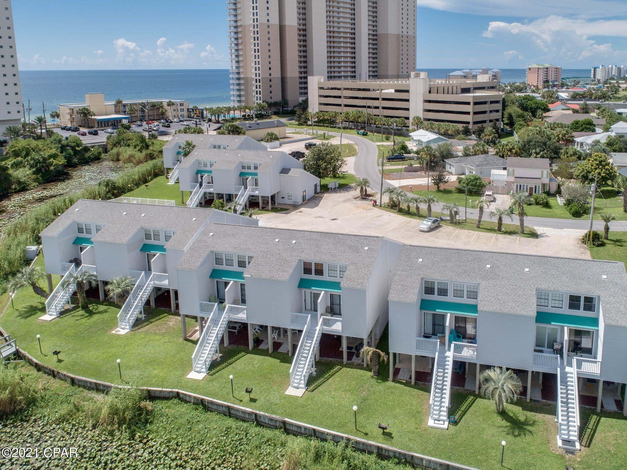 Excellent opportunity to own a fantastic, fully furnished, turn key, ground floor condo on the desired West End of Panama City Beach!!! This beautiful condo is only 1/2 block to your beach access!! All of the action at Pier Park is less than a mile away! Lakefront unit! Sit on your private back deck and watch stunning sunsets over the lake, or enjoy a dip in the community pool! Lots of updates include new flooring, updated bathroom and appliances, make this a very desirable unit. This is a great investment property, with a full Summer calendar already! Can't get down right away? Facetime showings available! Don't wait, call today! Age and sq. footage approximate, please verify if important.