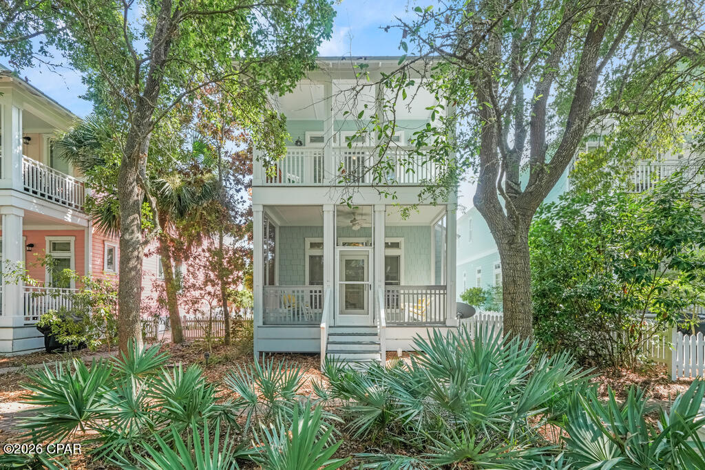 Welcome to Lily Pad, a charming 3-bedroom, 3-bath beach cottage offering 1,788 square feet in the gated Gulf-front community of Carillon Beach. Set in the western portion of the neighborhood, this inviting coastal retreat combines relaxed cottage style with excellent access to the beach and an impressive collection of community amenities.

The home's soft seafoam exterior, crisp white trim, white picket fencing and brick-paved approach create classic Carillon curb appeal, while the covered front porch offers a welcoming place to enjoy morning coffee or unwind after a day at the beach. Inside, abundant windows bring in natural light, and hardwood flooring, crown molding and a fresh coastal palette give the interiors an easy, timeless feel. The open living and dining areas are designed for comfortable gathering, while the kitchen offers ample cabinetry, stainless appliances and a practical layout for everyday living or vacation stays. A first-floor bedroom adds flexibility, and the spacious bunk room expands sleeping capacity for family and guests.

Carillon Beach is prized for its gated setting and approximately 3,900 linear feet of sugar-white Gulf shoreline. From Lily Pad, owners and guests can enjoy convenient access to beach walkovers, community pools, tennis and pickleball courts, basketball, a playground, walking paths and golf-cart-friendly streets. The neighborhood is also bordered by Lake Powell and lies near Camp Helen State Park, creating a distinctive setting that feels removed from the bustle while still offering easy access to dining, shopping and the 30A corridor.

For buyers seeking a second home, vacation retreat or rental investment, Lily Pad offers a versatile opportunity in one of the Emerald Coast's most distinctive coastal communities. Spend peak season enjoying the income potential of a vacation rental, reserve your favorite weeks for family traditions, or make this charming cottage your own private beach escape. With its appealing location, flexible floor plan and sought-after Carillon Beach lifestyle, 146 Parkshore Drive is ready for its next chapter.