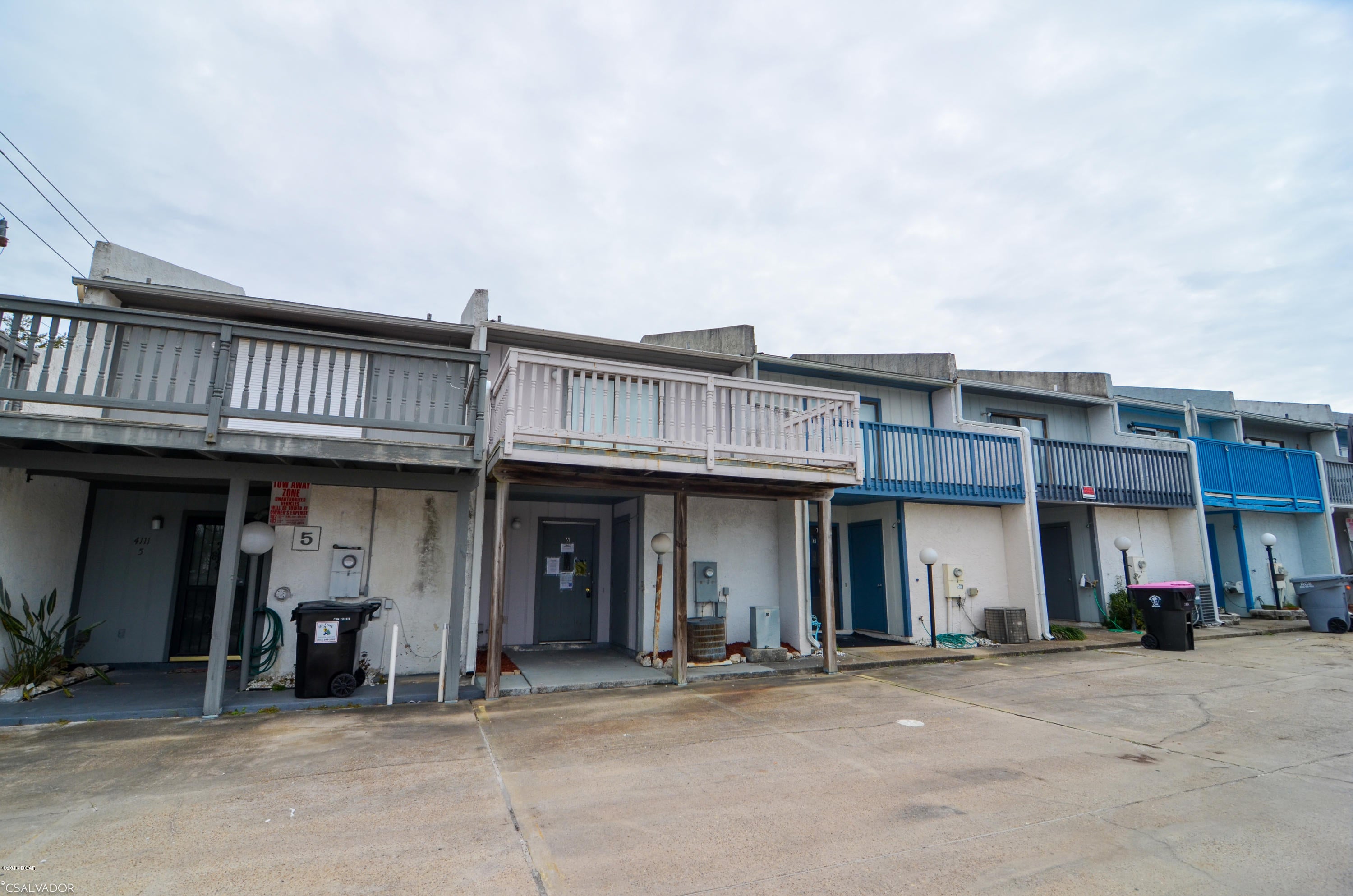 This town home has an awesome location. It is just 1 Block to a deeded beach access. There is a Gulf View from the Deck. This unit has a patio off of the living room area and a front deck off of the master bedroom and a back deck off of another bedroom. There are plenty of bathrooms for the whole gang and 2 nice large bedrooms and another smaller bonus room that is perfect for a bunk room There is a full bath as you enter the property along with a washer area so you can rinse off when you come home from the beach. This town home complex consists of 7 town homes. No HOA fees! This home will make a great beach rental or a beach get away. There are restaurants, shops and entertainment in walking distance .