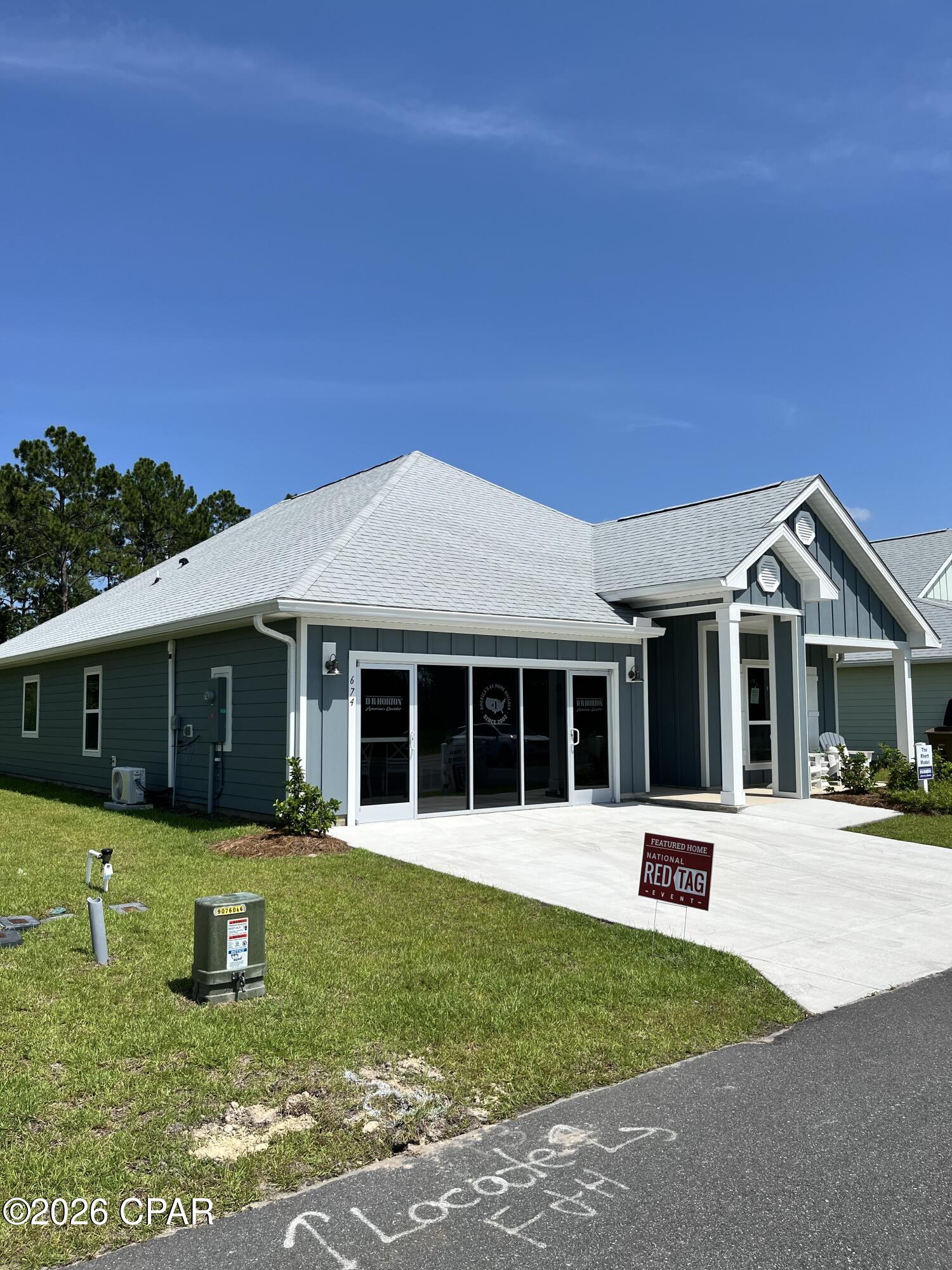 Welcome the Rhett, located at the peaceful Buffer Farms community in Port St. Joe, Florida. The Rhett is one of our popular one-story floor plans used in many communities in this area. With this 4 bedroom, 2 bath home, you will see 1,799 square feet of spacious living perfect for a small family to enjoy comfortably.

As you walk inside the Rhett, you will see the long main hallway leading you to the open living room and kitchen. The 9' ceilings throughout the home open your living space up and there are tray ceilings in the Primary bedroom and living room as an added feature. Engineered vinyl plank flooring throughout the home offers a sleek, low-maintenance way to keep your floors looking great. The kitchen and bathrooms feature quartz countertops and white cabinetry, a walk-in pantry, and a large island ideal for family and guests to enjoy your meals together. The primary bedroom has its own bathroom featuring a spacious walk-in closet, a double vanity, and a separate walk-in shower and tub. Each room in the house has large windows that allow plenty of natural light in to brighten your mood and home up.

On the exterior of the home, you will see beautiful Hardie Board on all sides of the home. Each home comes standard with gutters, a sodded yard, dimensional shingles, and more. The Rhett features a covered back patio and a covered front porch, perfect for a rocking chair to enjoy your coffee on those sunny mornings.

Whatever room in this house you're in, you will feel right at home. Contact us today to find your home at Buffer Farms!