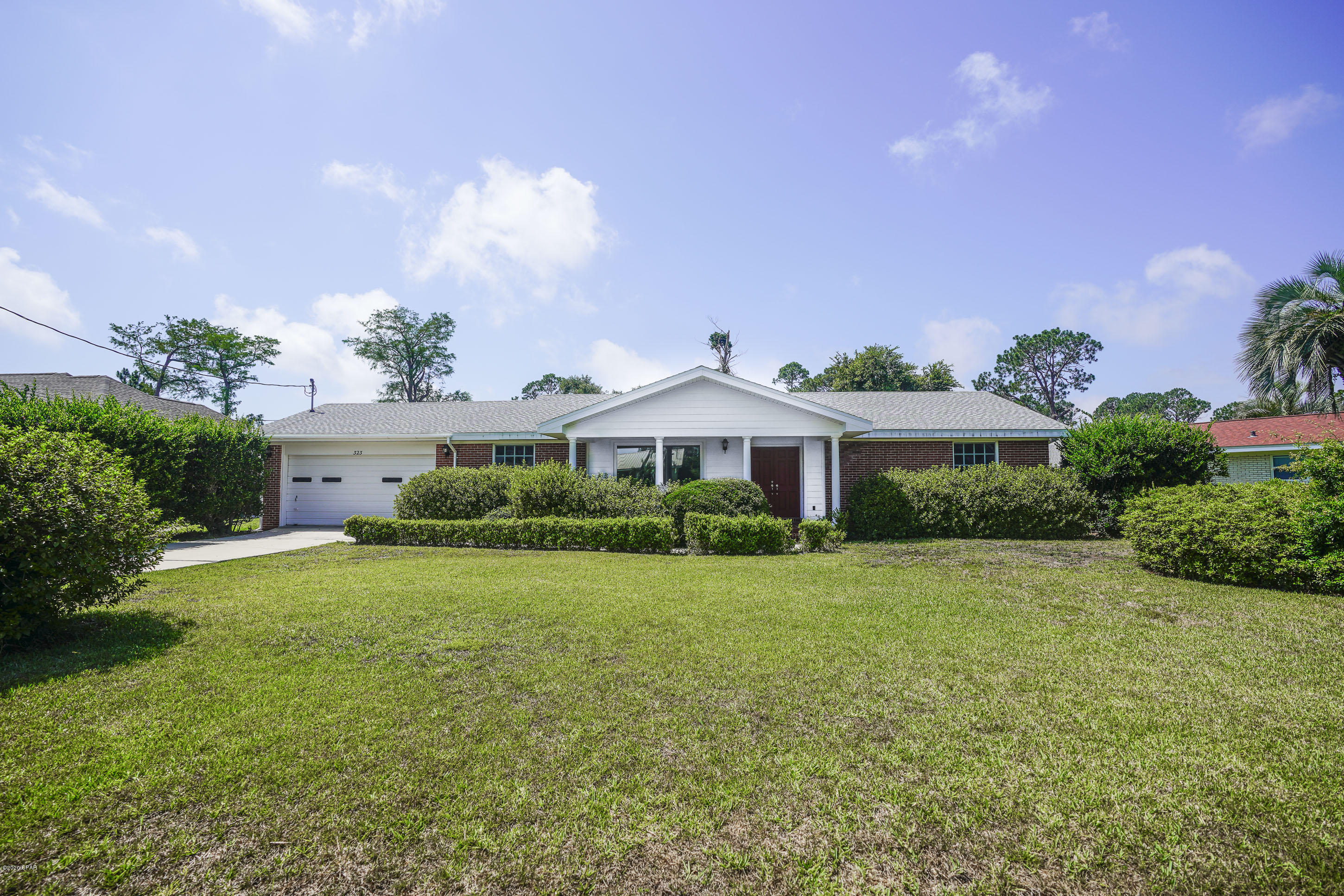 You'll really enjoy living in this well cared for, super clean, traditional ranch home in the quiet neighborhood of Woodlawn. Every room is huge featuring 3 bedrooms 2 baths, living room with beautiful large window, a formal dining room, large family room, an open eat-in kitchen, and 2 pantries. Both baths beautifully updated, charming Terrazzo floors, new carpet as well. Oversized 2 car garage with overhead storage, and an extra storage room. The landscaping is well manicured and the back yard is perfect. Sorry, no pets.