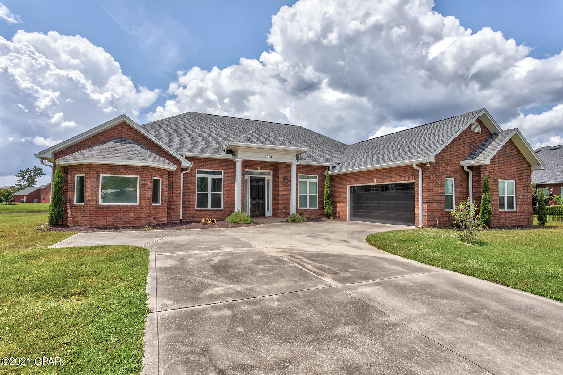 Come see this beautiful 4 bed, 2.5 bath, 3,000+ SqFt home built by Rick Koehnemann located in College Point! There are many high end features throughout the home, most notably the amazing master bath. With large jetted tub, double vanities plus huge shower that contains two shower heads, lovely terrazo tile and ample natural light, making it feel like a personal spa. The master suite has his/hers walk-in closets and it's own entrance to the back patio. The grand foyer opens into a large entertainment space with formal dining room, french doors leading to an office/bedroom, and gas fireplace nestled in the living room. Impress your guests with your culinary skills while cooking in the lavish kitchen that comes equipped with gas stove, black stainless appliances, island and granite countertops. Additional bedrooms come with plenty of closet space and share a large jack & jill bathroom in between. An oversized bonus room allows for multiple uses such as home gym, game room, studio, or man cave. Don't miss the opportunity to own this timeless home! Set up your private showing today!
