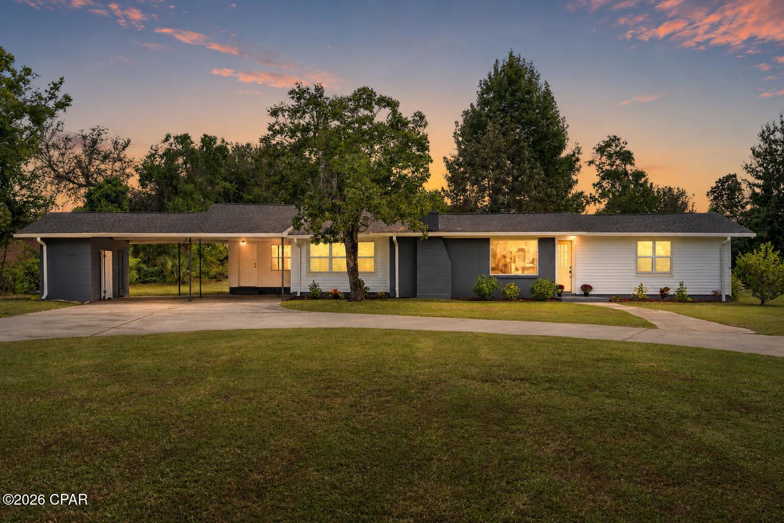 Completely renovated 3-bedroom, 2-bathroom home on nearly an acre in Panama City, FL! This 1,664 sq ft contemporary single-family home at 5136 Lake Dr has been fully updated with a brand-new kitchen, remodeled bathrooms, and new flooring throughout -- move-in ready from day one. Enjoy the rare combination of a spacious, almost one-acre lot with the convenience of city living, plus a covered carport for easy parking. The generous lot offers plenty of room to add a pool, outdoor living space, or even a workshop, giving you the flexibility to make this property your own. Vacant and available for immediate occupancy, this property is also approved for short-term rental use, making it a fantastic opportunity for homeowners and investors alike. Don't miss this rare find -- schedule your private showing today!