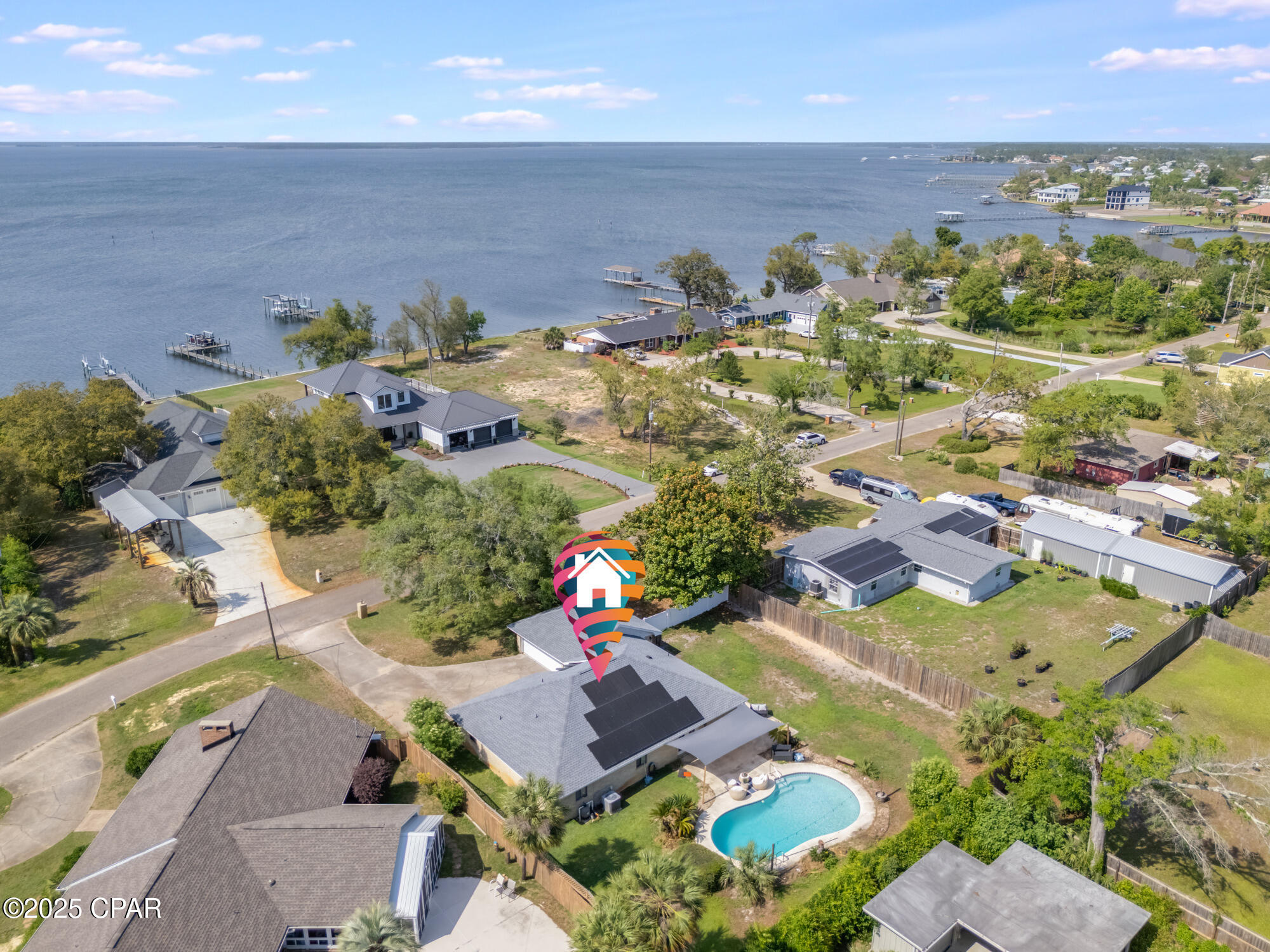 Tenant Occupied- Please call for more details! Bay views, a private pool, and an extra lot for outdoor living. This 3-bedroom, 2.5-bath home sits in a low-traffic neighborhood near the bay, walking distance to Carl Gray Park and the boat launch. Inside: LVP flooring, granite countertops, new light fixtures, and a open dining & living space perfect for hosting. Outside: a fully fenced backyard, in-ground pool with a new pump and filter, new irrigation system covering both front and back yards, and plenty of space for entertaining. 
Monthly rent includes partial electricity with solar panels and weekly professional pool service. *Pets allowed with prior approval*