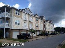 Great condo/town home gated community with club house, small gym and pool. This unit is a 3 bedroom 2 bath condo flat over looking the central pond and pool. This unit features granite counter tops, tile floors with carpet in the bedrooms, a one car garage, and washer and dryer hook up. Water, sewer, trash, basic cable, phone and internet are include. Tenant pays electricity.