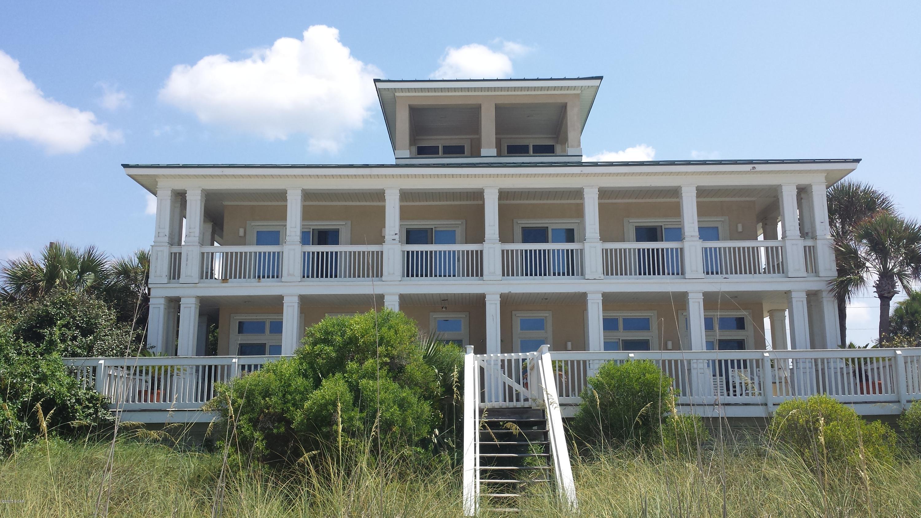 Here is a golden opportunity for a large beach home on the “World’s Most Beautiful” beaches. This luxury home is actually a duplex with mirroring floor plans. Enjoy 4 bedrooms and 5 baths on each side plus a large 3rd floor viewing room, (most suitable for a play room or a man cave). Each home comes fully furnished and has expansive views. The ground floor is wide open with the fully equipped kitchen having beach front views looking over a large family dining area and a huge living room. The large back deck gives direct access to the sand and sunsets. The second floor has four bedrooms, each with their own bathroom and closet. The Master Bedroom and bedroom 1 both have balconies overlooking the shoreline. Ideally located on the west end of the beach, don’t miss this opportunity.