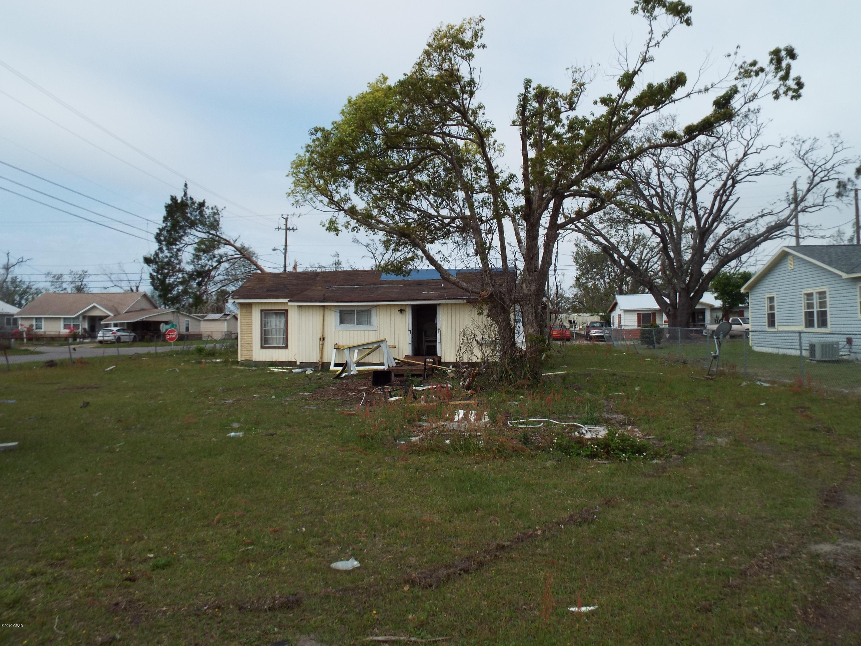 This large corner lot is perfect for a new construction home. It is being sold as is for the land value only. The home on the property has severe damage due to the hurricane.