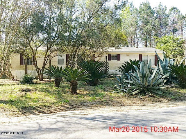 2000 Fleetwood Mobile Home, 27 X 60, with 3 bedrooms and 2 full baths. Large living room with wood-burning fireplace. Nice master bathroom with garden tub. Concrete parking pad in front of home. Located on a paved road with 236 feet of road frontage on Highway 183. This home does have some damages to vinyl flooring and carpeting, stove and refrigerator have been removed, and electrical panel at power pole does not have needed breakers. This home will not qualify for conventional financing. Price reflects repairs needed.