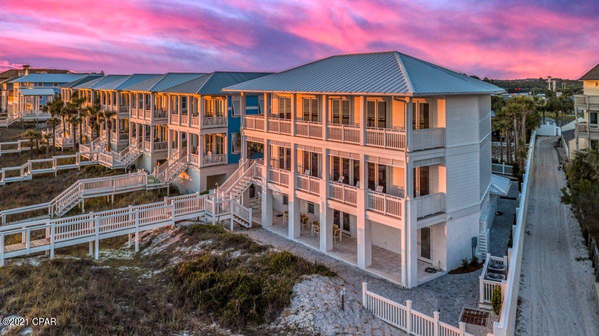 Bank Appraised this home for over list price! 

Spectacular house and guest house on a 140' beach lot in the gated community of Carillon Beach. Built in 2019, this is an investment property or a fabulous private family vacation compound  that will exceed your expectations. The property will accommodate 22 guests in its 8 bedrooms and 7 ensuite bathrooms, 3.5 powder rooms, private pool and over 3,900 linear feet of community beach stretching before you. No crowds in the sand on this beach. With over 6,000 square feet of luxury living and high-end amenities and 2,000+ sq ft of covered porches, this modern beachfront masterpiece is in a category all it's own. Main house and guest house can be rented together or independently and grossed over $370,000 last year during COVID restrictions. Management company's projections state this house will make over $450,000.