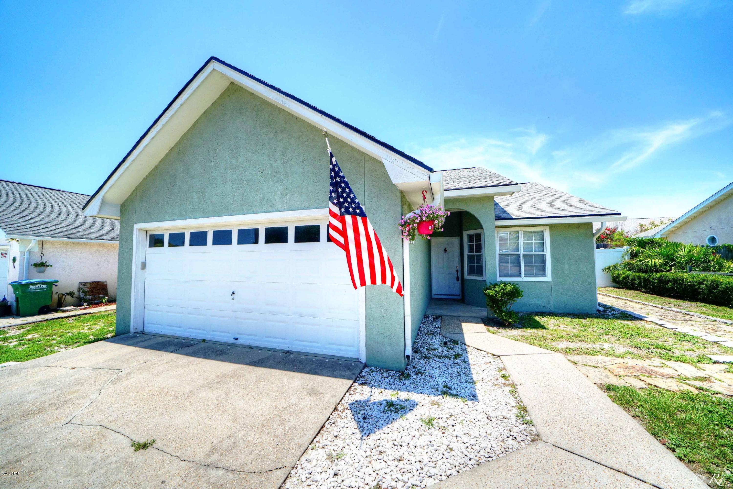 Are you ready to move to BID-A-WEE BEACH?? This nostalgic community offers dedicated beaches and is golf cart friendly! 2-2 with double car garage. Argonaut Street intersects with Front Beach Rd right in front of the private beach access. Just a short drive to Pier Park and Holiday Golf Club. Voluntary Home Owners Association . Recent renovations and upgrades include the installation of a new roof, gutters and private backyard fence surrounding the back patio and gazebo. 3-ton HVAC system was newly installed this last year. Great potential for a primary residence or 2nd home. This is the perfect opportunity to BUY THIS BEACH HOUSE.
