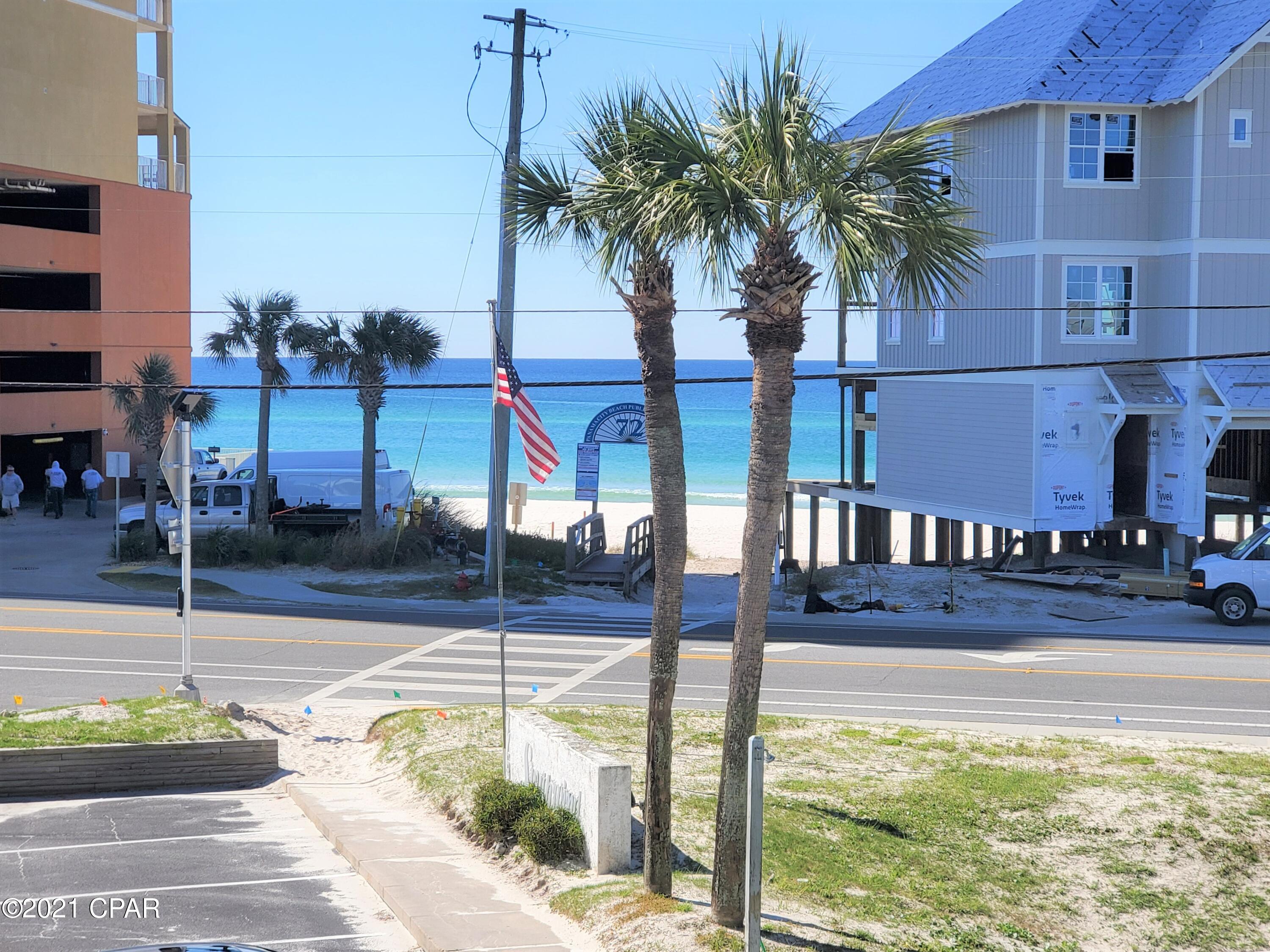 This is the perfect beach getaway condo!  It is in the best location at Southwind: the first building closest to the beach on the ground floor.  Relax on your front porch with the salty breeze and serene gulf views! It is one of the few smaller complexes on the west end just a few steps to the beach.  This unit is beautiful and ready to enjoy.  It comes furnished with a few execptions.  The spacious living room has tile floors, fresh paint and charming beachy decor.  The kitchen has new quartz counters and stainless appliances.  There is a built in bed in the hallway (which could easily accomodate an upper bunk).  The bedroom opens to a back patio which is great if you have a pet.  The complex is pet friendly for owners only.  This is one you'll want to see in person.