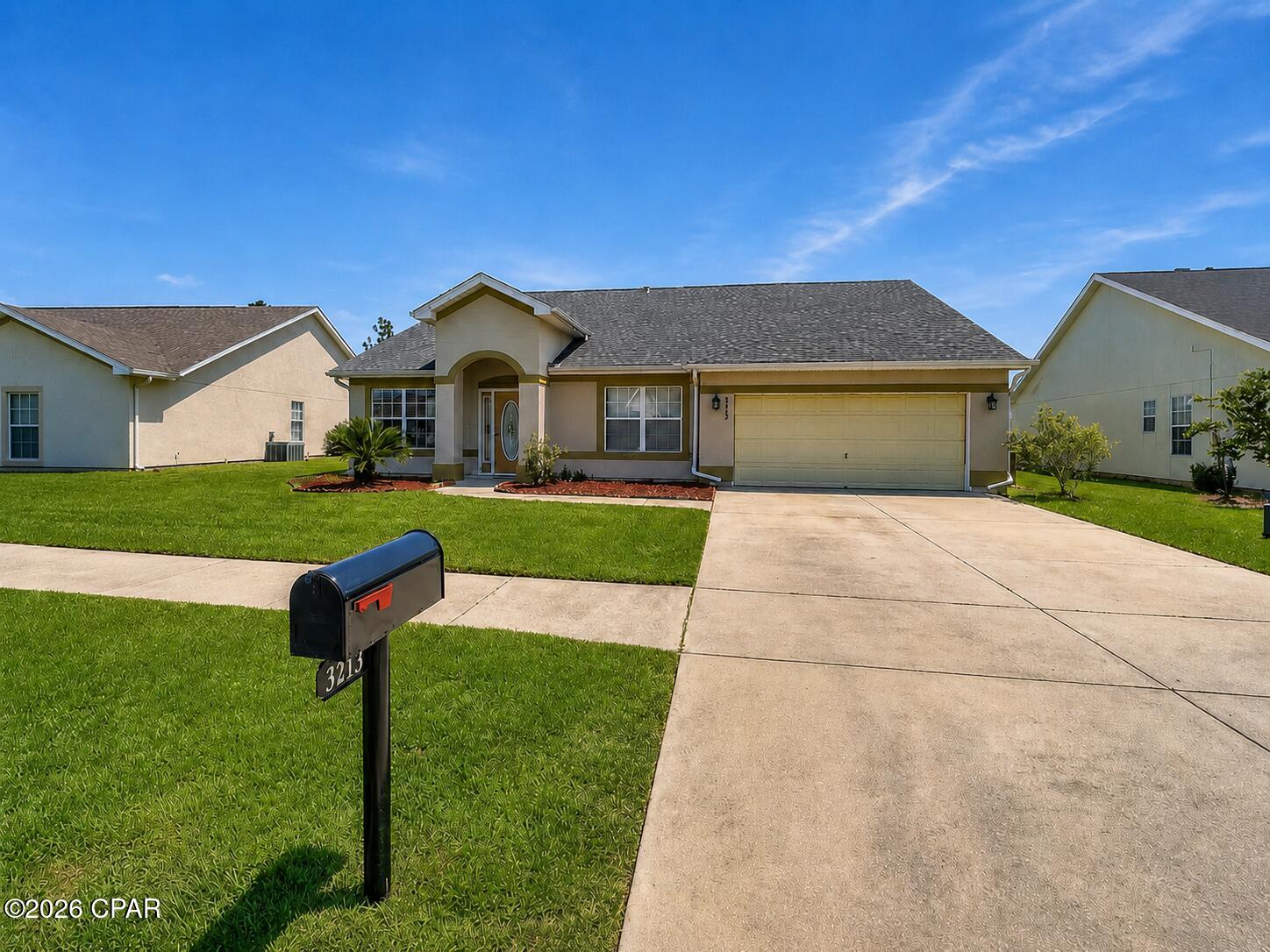 Welcome to 3213 Azalea Circle, a spacious four-bedroom, two-and-a-half-bath home offering approximately 2,249 square feet in The Hammocks community of Lynn Haven.

The bright, open layout features expansive living and dining areas with attractive wood-look flooring, abundant natural light, and plenty of flexibility for everyday living or entertaining. The kitchen offers generous cabinet and countertop space, stainless-steel appliances, a breakfast bar, and an easy connection to the main living area.

All four bedrooms feature hard-surface flooring, while select rooms offer ceiling fans and rich accent walls. The bathrooms provide distinctive finishes, including tiled tub surrounds, vessel sinks, dark fixtures, wood countertops, built-in storage, and a double-sink vanity. A separate half bathroom adds convenience for residents and guests.

Huge back yard! Pets welcome!

Additional features include central heating and air conditioning, washer and dryer connections, a patio, and an attached two-car garage. Residents can also enjoy access to The Hammocks community swimming pool.

Conveniently located near Lynn Haven and Panama City shopping, dining, schools, medical services, and everyday necessities, with Panama City Beach and public Gulf beach accesses within driving distance.

Schedule your showing today and discover the generous space, updated finishes, and community amenities available at 3213 Azalea Circle.